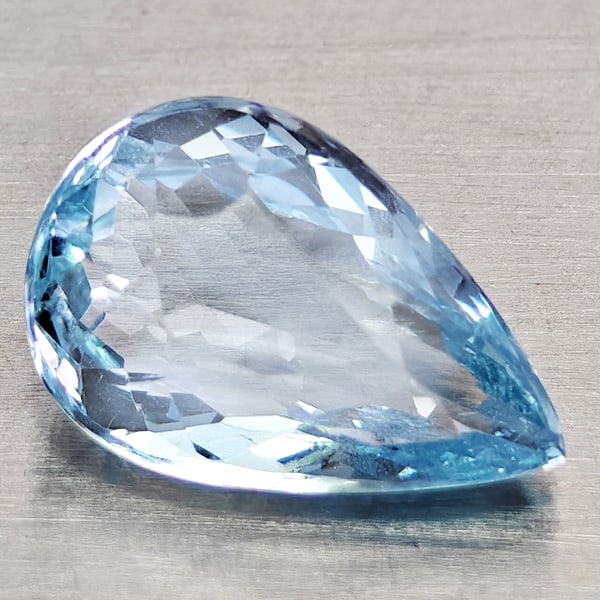 Natural Light Blue Aquamarine Gemstones 1.32 Ct. Pear Shape 9.4 x 6.3 Mm.: Product ID: 800812301 Product Name: Natural Aquamarine Weight: 1.32 CT. Size: 9.4 x 6.3 x 4.1 MM. Shape: Pear Shape Color: Light Blue Clarity:VSI - SI1 Luster: Good Gems Origin: Brazil Treatment: Unhe