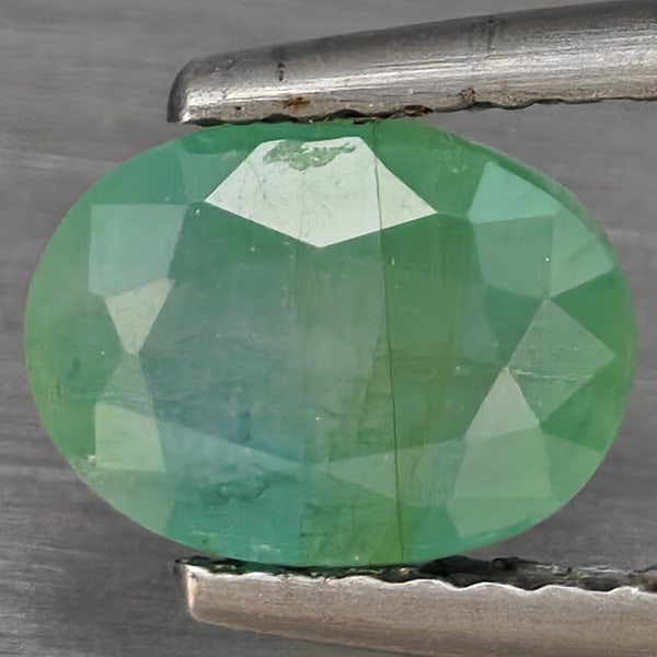 Natural Green Blueish Grandidierite Gemstones 1.51 Ct. Oval Shape 7.8 x 5.8 Mm.: Product ID: 803100115 Product Name: Natural Tsavorite Weight: 1.51 CT. Size: 7.8 x 5.8 x 4 MM. Shape: Oval Shape Color: Green Blueish Clarity:SI1 Luster: Good Gems Origin: Madagascar Treatment: Unheat