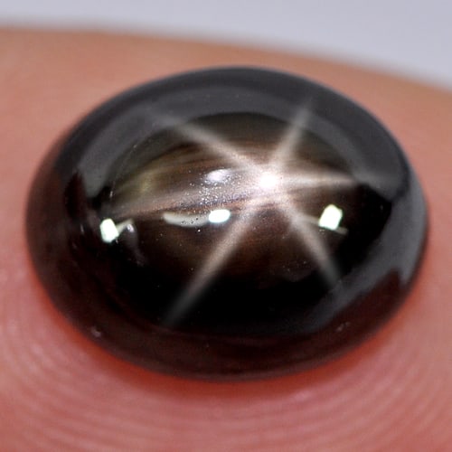 Natural Black Star Sapphire Gemstones 6.87 Ct. Oval Cabochon Shape 11.2 x 8.8 Mm.
