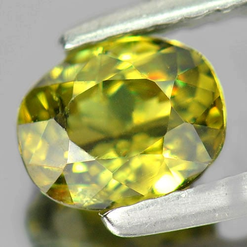 Natural Demantoid Garnet Gemstones 1.02 Ct. Oval Shape 6.4 x 5.2 Mm.