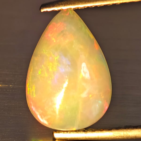 Natural Multi-Color Play Of Colour Opal Gemstone 1.79 Ct. Pear Cabochon Shape 12.5 x 9 Mm.