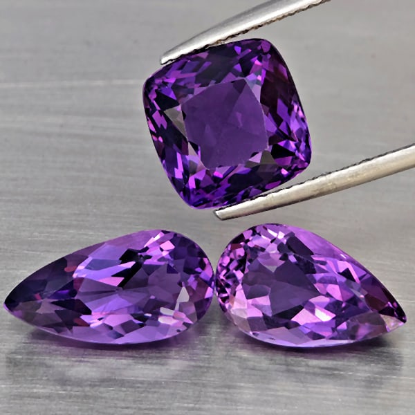 Natural Purple Amethyst Gemstones 11.15 Ct. 3 Pcs. Mixed Shape and Mixed Size: Product ID: 800325639 Product Name: Natural Amethyst Weight: 11.15 CT. Size: 13.9 x 7.3 x 5.9 to 10.2 x 10.2 x 7.1 MM. Shape: Mixed Shape Color: Purple Clarity:VVS Luster: Very Good Gems Origin: Brazi