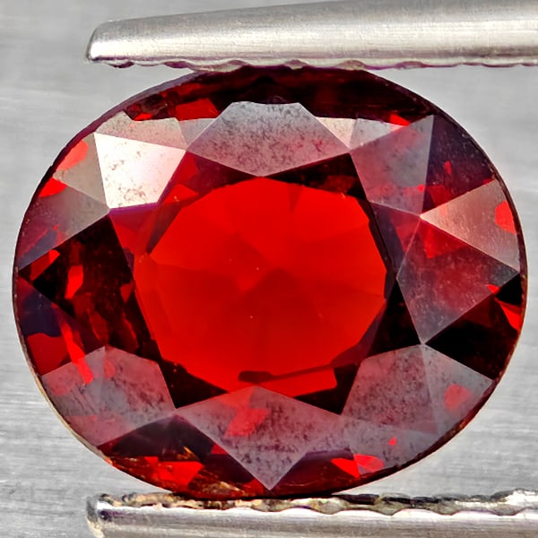 Natural Orangish Red Spessartine Garnet Gemstones 1.79 Ct. Oval Shape 7.5 x 6.5 Mm.: Product ID: 802937198 Product Name: Natural Spessartine Weight: 1.79 CT. Size: 7.5 x 6.5 x 3.9 MM. Shape: Oval Color: Orangish Red Clarity:VSI Luster: Good Gems Origin: Namibia Treatment: Unheated Cry