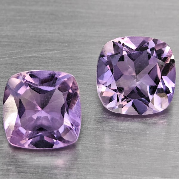 Natural Purple Amethyst Gemstones 1.89 Ct. 2 Pcs. Cushion Shape 6.2 Mm.: Product ID: 800325562 Product Name: Natural Amethyst Weight: 1.89 CT. Size: 6.2 x 6.2 x 4.2 MM. Shape: Cushion Shape Color: Purple Clarity:VSI Luster: Good Gems Origin: Brazil Treatment: Unheated Crys