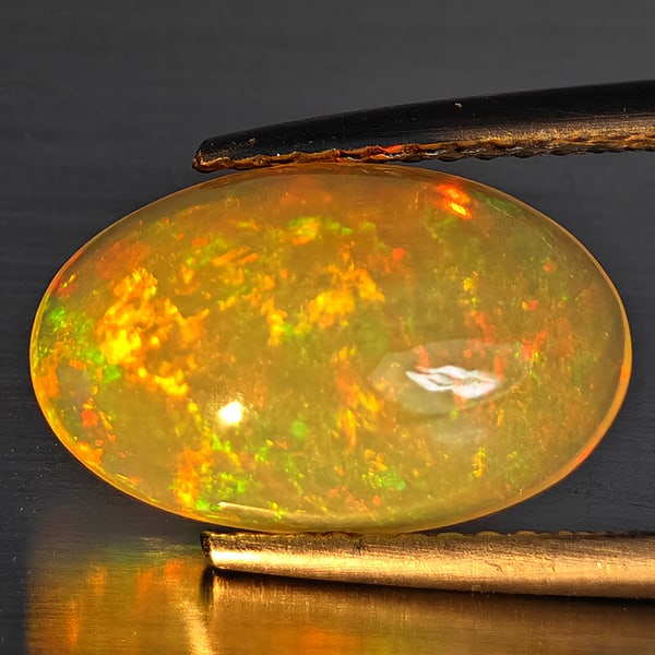 Natural Multi-Color Play Of Colour Opal Gemstone 2.84 Ct. Oval Cabochon Shape 13.7 x 8.7 Mm. (1 of 3)
