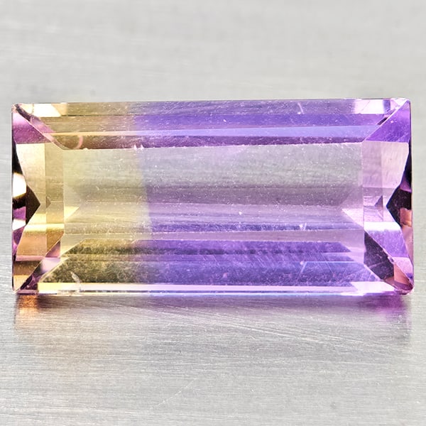 Natural Bi Color Ametrine Gemstones 2.66 Ct. Baguette Shape 12.1 x 5.9 Mm.: Product ID: 800408532 Product Name: Natural Ametrine Weight: 2.66 CT. Size: 12.1 x 5.9 x 4.5 MM. Shape: Baguette Color: Bi Color Clarity:VSI Luster: Good Gems Origin: Bolivia Treatment: Unheated Cryst