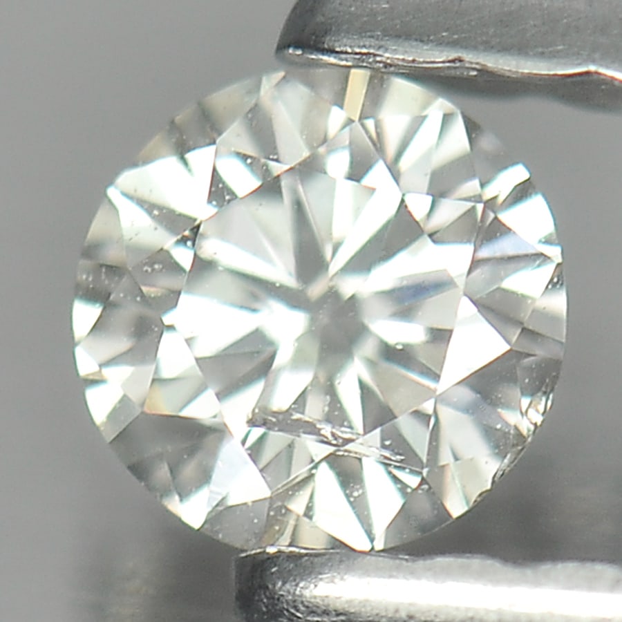 Natural White Diamond 0.15 Ct. Round Brilliant Cut 3.6 x 3.6 x 2.2 Mm.: Product ID: 802101197 Product Name: Natural Natural Diamond Weight: 0.15 CT. Size: 3.6 x 3.6 x 2.2 MM. Shape: Round Brilliant Cut Color: G Clarity:SI1 Luster: Scintillating Gems Origin: Belgium Treatm