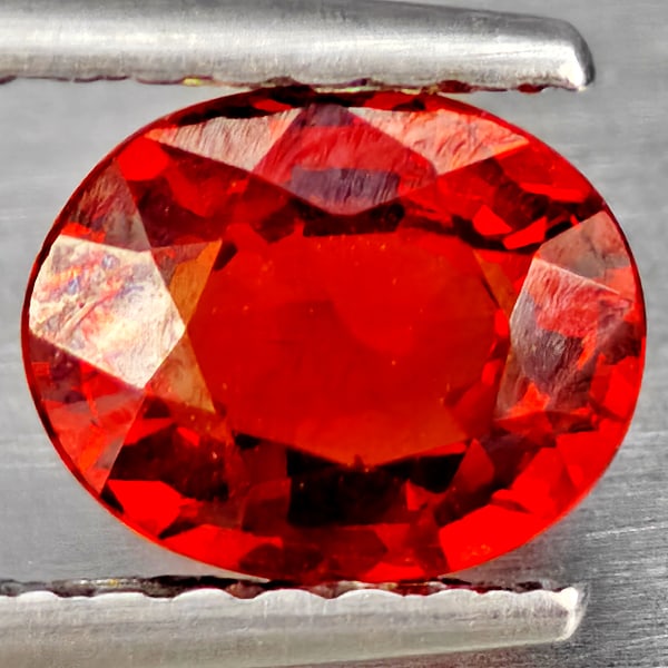 Natural Orangish Red Spessartine Garnet Gemstones 0.97 Ct. Oval Shape 6.4 x 5.2 Mm.