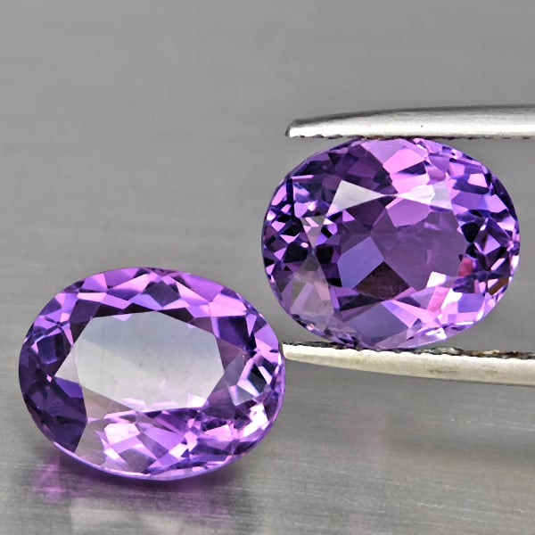 Natural Purple Amethyst Gemstones 8.71 Ct. 2 Pcs. Oval Shape 11.9 x 9.8 Mm.: Product ID: 800325648 Product Name: Natural Amethyst Weight: 8.71 CT. Size: 11.9 x 9.8 x 6.4 MM. Shape: Oval Shape Color: Purple Clarity:VVS Luster: Very Good Gems Origin: Brazil Treatment: Unheated C