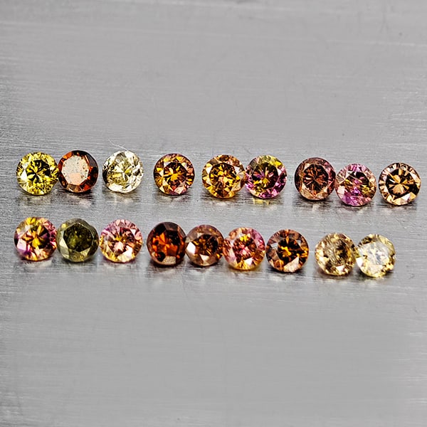 Natural Multi Color Diamond 0.24 Ct. 18 Pcs. Round Diamond Cut 1.5 Mm.: Product ID: 802104586 Product Name: Natural Enhanced Diamond Weight: 0.24 CT. Size: 1.5 x 1.5 x 1.0 MM. Shape: Round Diamond Cut Color: Multi Color Clarity:SI1 Luster: Scintillating Gems Origin: Belgi