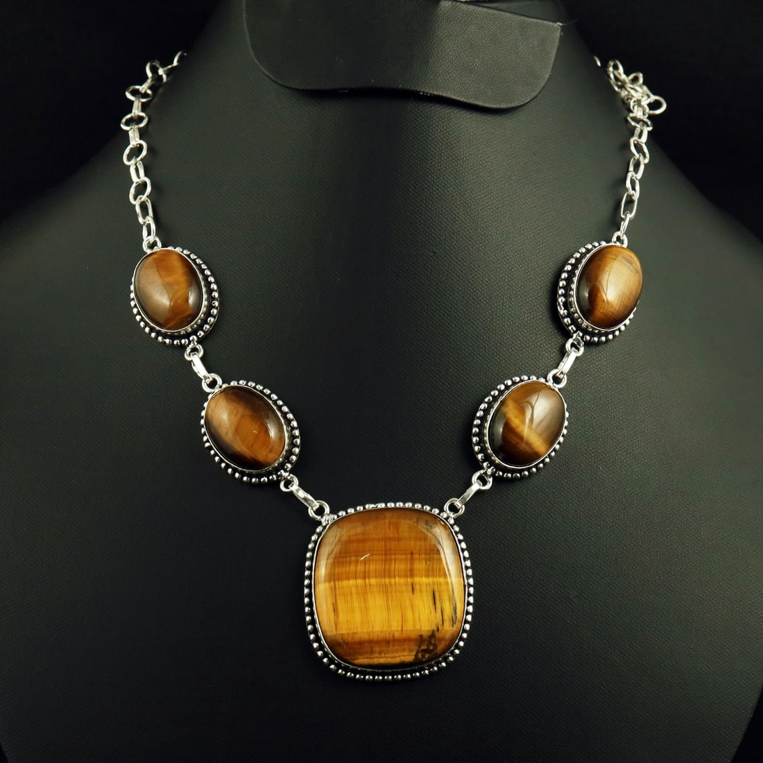 Natural Tiger Eye Sterling Silver Plated Handmade Necklace: Product ID: 260730114545 Product - Handmade Silver Plated Necklace Metal - 92.5 Sterling Silver Plated Necklace Length - 18 Inch Gemstone - Tiger Eye Gemstone Origin - South Africa Gemstone Shape - Ov