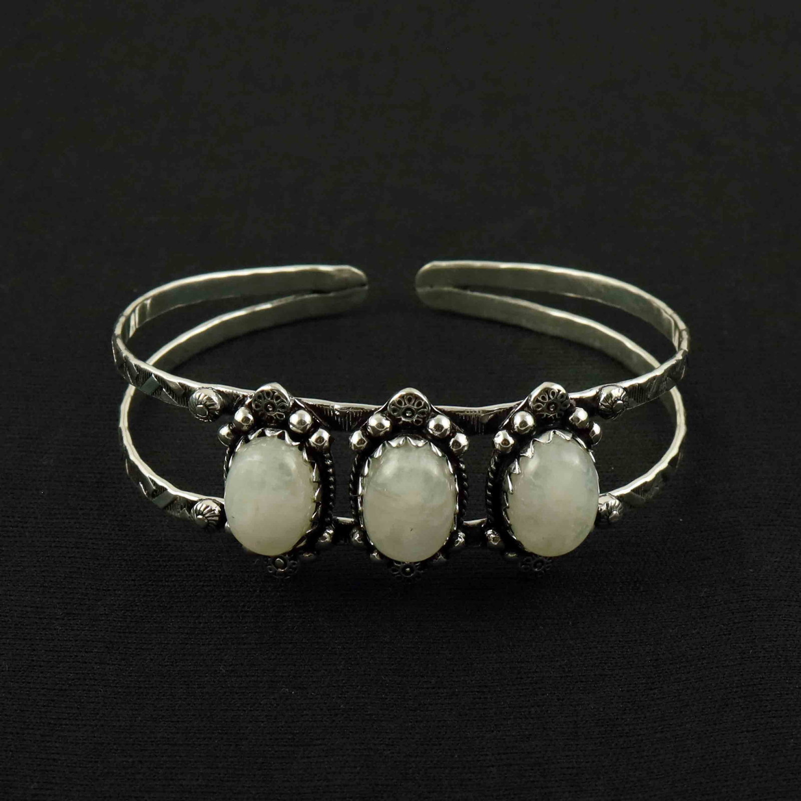 Natural Rainbow Moonstone Sterling Silver Plated Handmade Cuff Bangle: Product ID: 260528190323 Product - Handmade Silver Plated Cuff Bangle Metal - 92.5 Sterling Silver Plated Bangle Size - 7x5 CM (Adjustable) Gemstone - Rainbow Moonstone Gemstone Origin - India Gemston