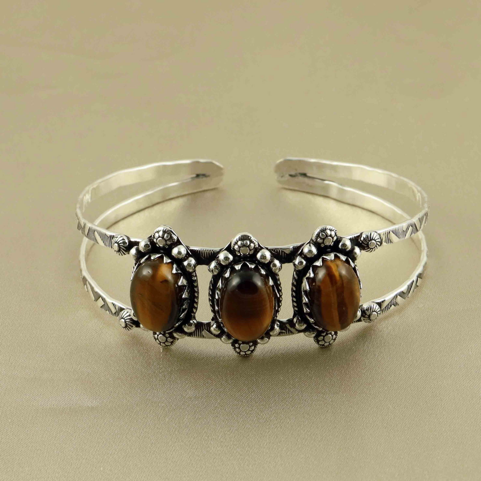 Natural Tiger Eye Sterling Silver Plated Handmade Cuff Bangle: Product ID: 260528184235 Product - Handmade Silver Plated Cuff Bangle Metal - 92.5 Sterling Silver Plated Bangle Size - 7x5 CM (Adjustable) Gemstone - Tiger Eye Gemstone Origin - South Africa Gemstone