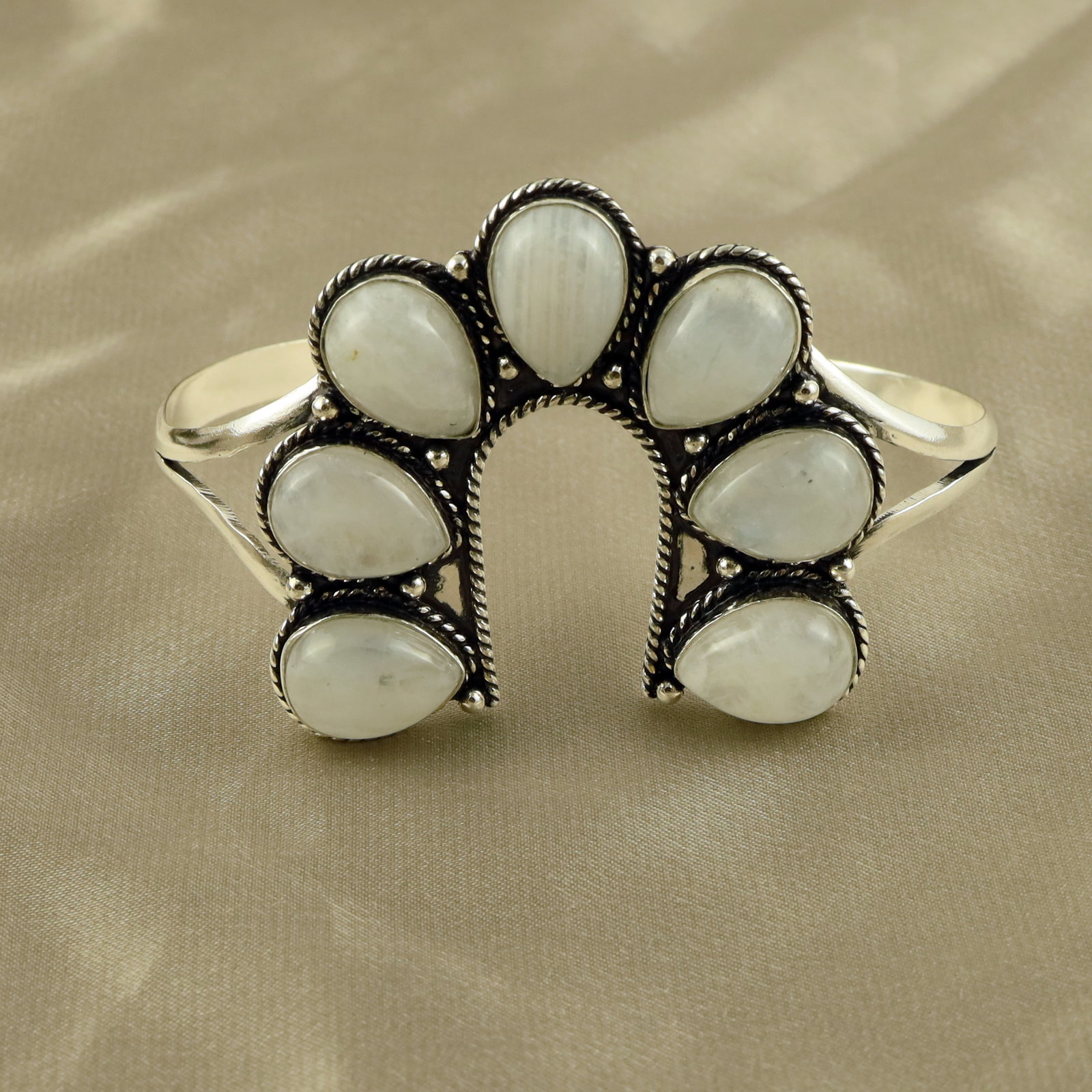Natural Rainbow Moonstone Sterling Silver Plated Handmade Cuff Bangle: Product ID: 260521140717 Product - Handmade Silver Plated Cuff Bangle Metal - 92.5 Sterling Silver Plated Bangle Size - 7x4.5 CM (Adjustable) Gemstone - Rainbow Moonstone Gemstone Origin - India Gemst