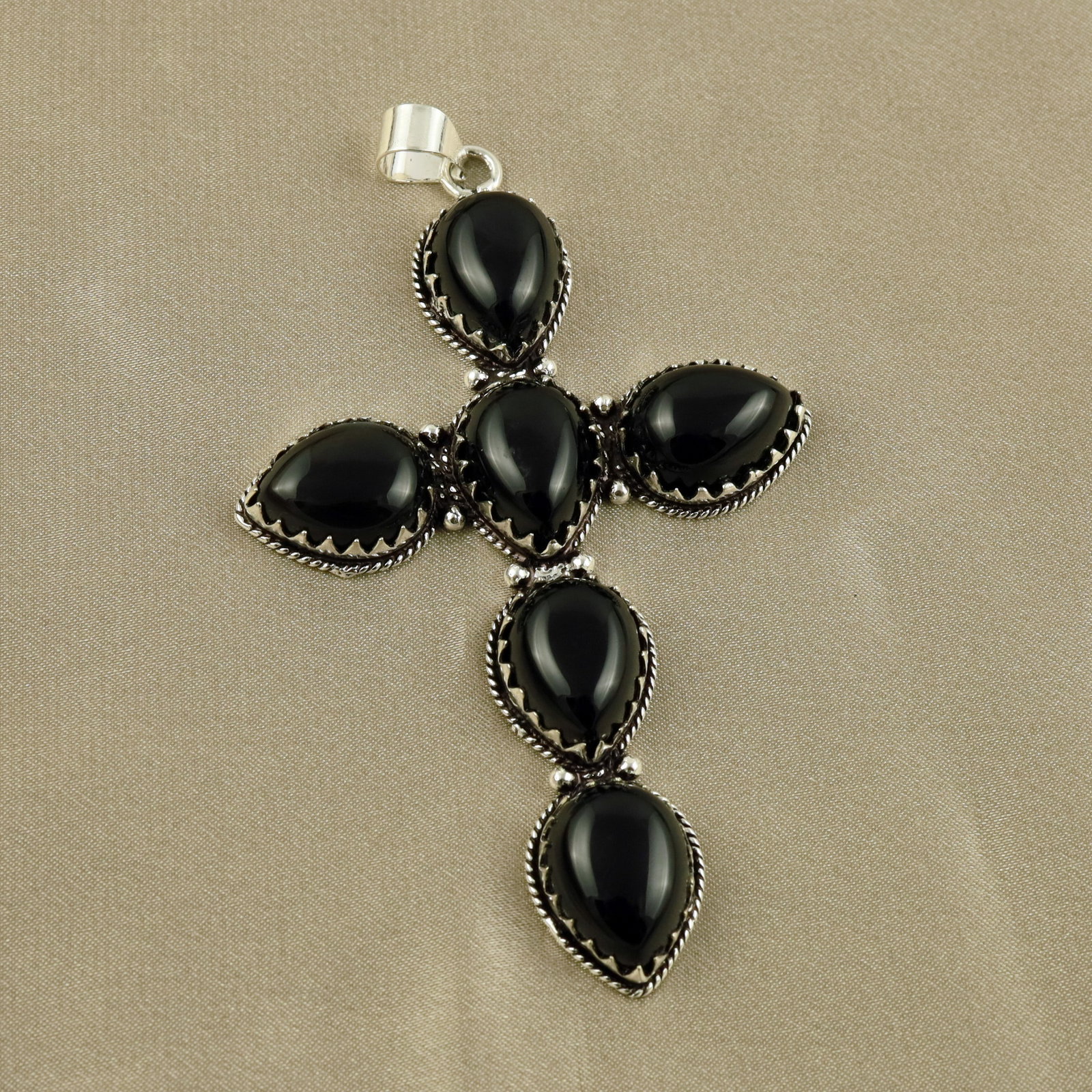 Natural Black Onyx Sterling Silver Plated Handmade Cross Pendant: Product ID: 260519131533 Product - Handmade Silver Plated Pendant Metal - 92.5 Sterling Silver Plated Pendant Size - 3.5x2 Inch Gemstone - Black Onyx Gemstone Origin - India Gemstone Size - 12x16 MM (