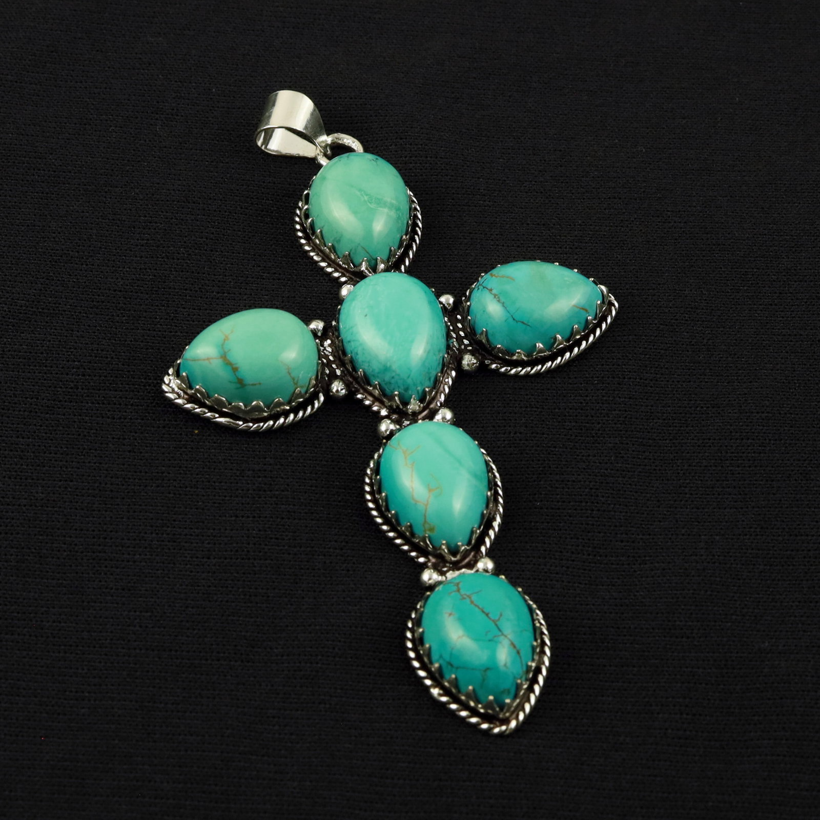 Natural Turquoise Sterling Silver Plated Handmade Cross Pendant: Product ID: 260519130147 Product - Handmade Silver Plated Pendant Metal - 92.5 Sterling Silver Plated Pendant Size - 3.5x2 Inch Gemstone - Turquoise Gemstone Origin - Tibet Gemstone Size - 12x16 MM ( 