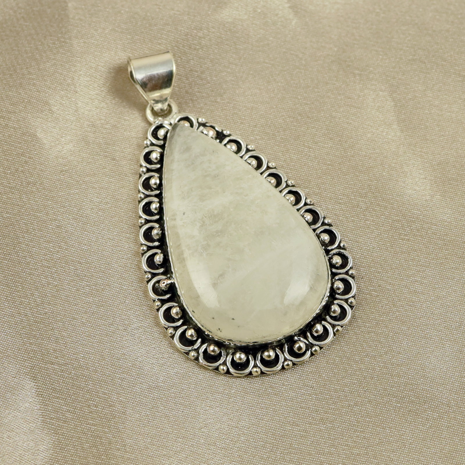 Natural Rainbow Moonstone Sterling Silver Plated Handmade Pendant: Product ID: 260518131145 Product - Handmade Silver Plated Pendant Metal - 92.5 Sterling Silver Plated Pendant Size - 5x3CM Gemstone - Rainbow Moonstone Gemstone Origin - India Gemstone Shape - Pear Pe