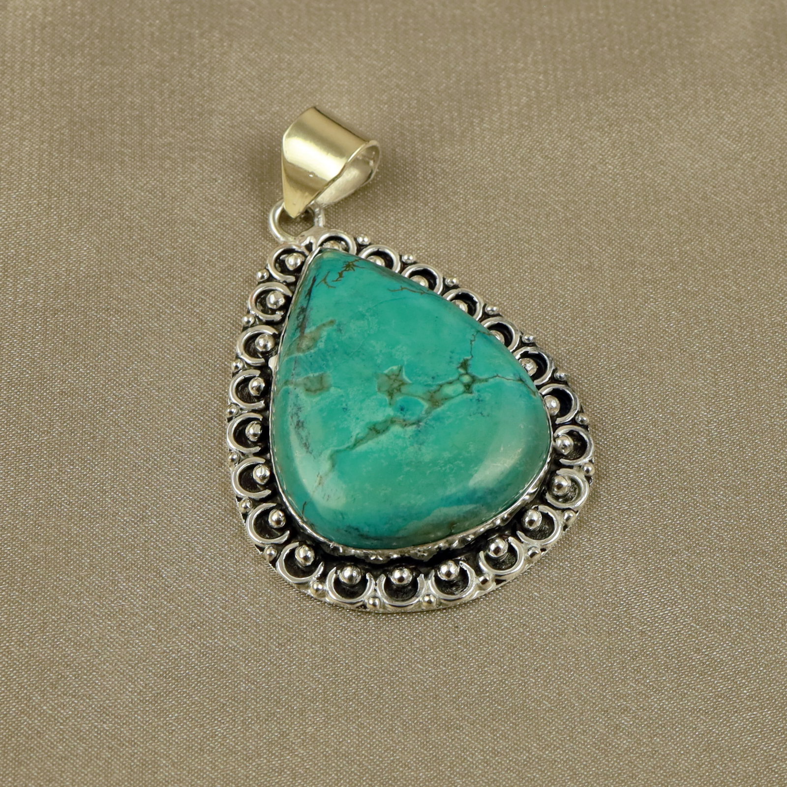 Natural Turquoise Sterling Silver Plated Handmade Pendant: Product ID: 260518133401 Product - Handmade Silver Plated Pendant Metal - 92.5 Sterling Silver Plated Pendant Size - 4x3CM Gemstone - Turquoise Gemstone Origin - Tibet Gemstone Shape - Pear Pendant We