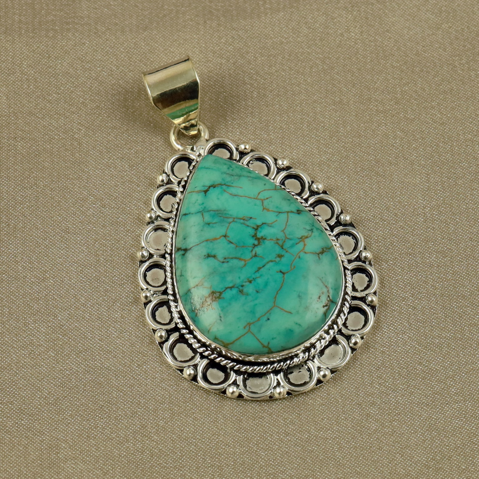 Natural Turquoise Sterling Silver Plated Handmade Pendant: Product ID: 260518133451 Product - Handmade Silver Plated Pendant Metal - 92.5 Sterling Silver Plated Pendant Size - 4x3CM Gemstone - Turquoise Gemstone Origin - Tibet Gemstone Shape - Pear Pendant We