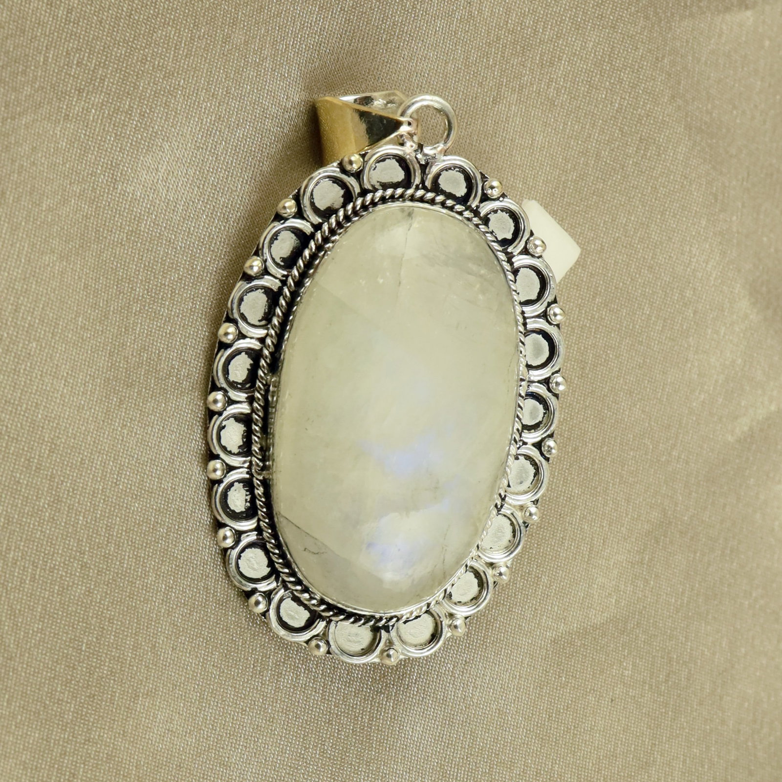 Natural Rainbow Moonstone Sterling Silver Plated Handmade Pendant: Product ID: 260518130113 Product - Handmade Silver Plated Pendant Metal - 92.5 Sterling Silver Plated Pendant Size - 4.5x3CM Gemstone - Rainbow Moonstone Gemstone Origin - India Gemstone Shape - Oval 