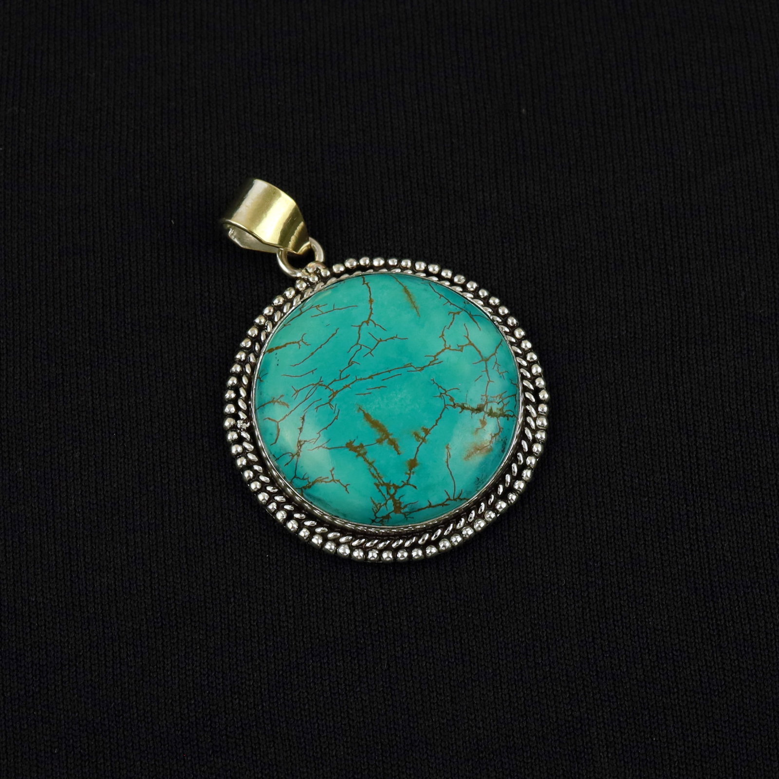 Natural Turquoise Sterling Silver Plated Handmade Pendant: Product ID: 260513103924 Product - Handmade Silver Plated Pendant Metal - 92.5 Sterling Silver Plated Pendant Size - 3.5 CM Gemstone - Turquoise Gemstone Origin - Tibet Gemstone Shape - Round Pendant 