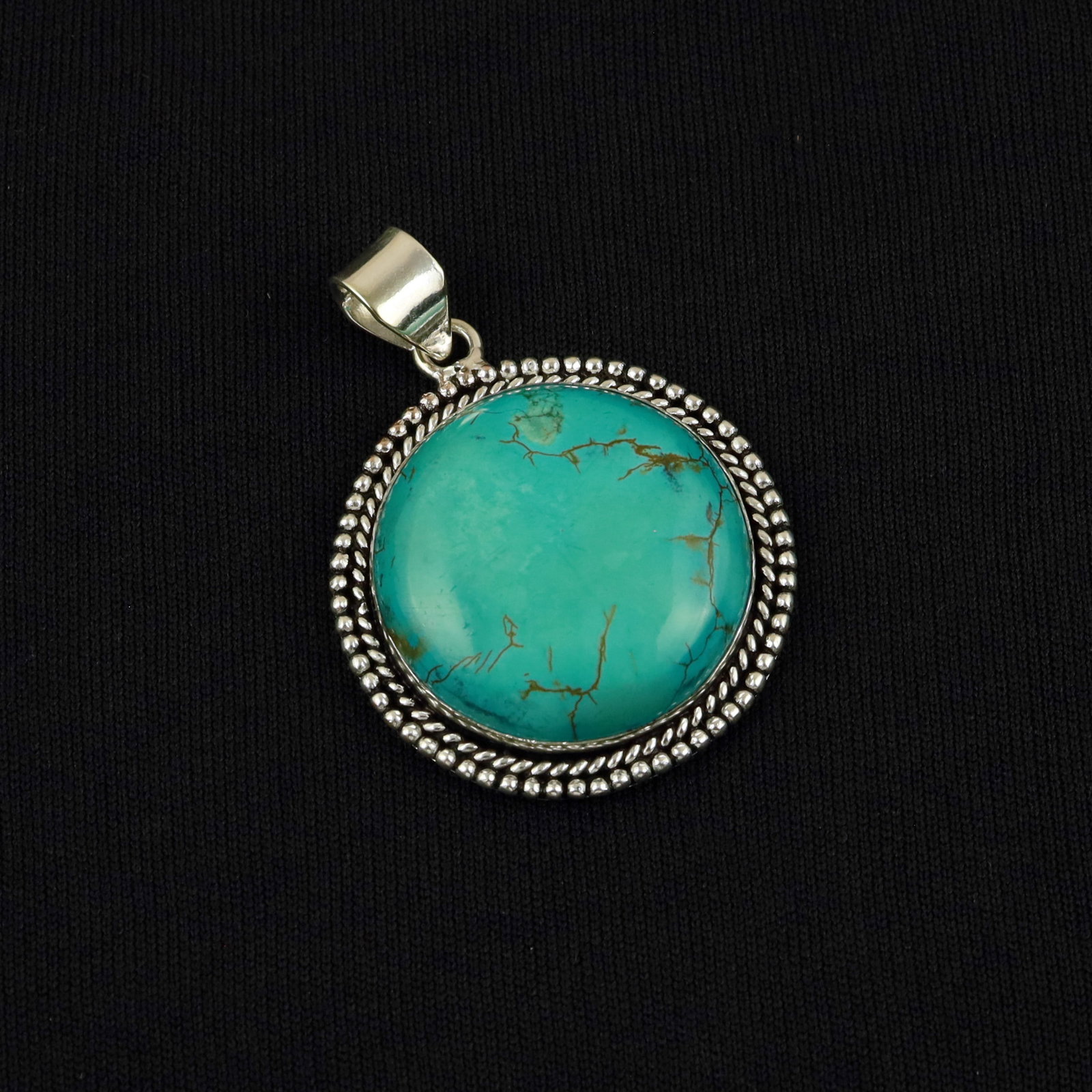 Natural Turquoise Sterling Silver Plated Handmade Pendant: Product ID: 260513104004 Product - Handmade Silver Plated Pendant Metal - 92.5 Sterling Silver Plated Pendant Size - 3.5 CM Gemstone - Turquoise Gemstone Origin - Tibet Gemstone Shape - Round Pendant 