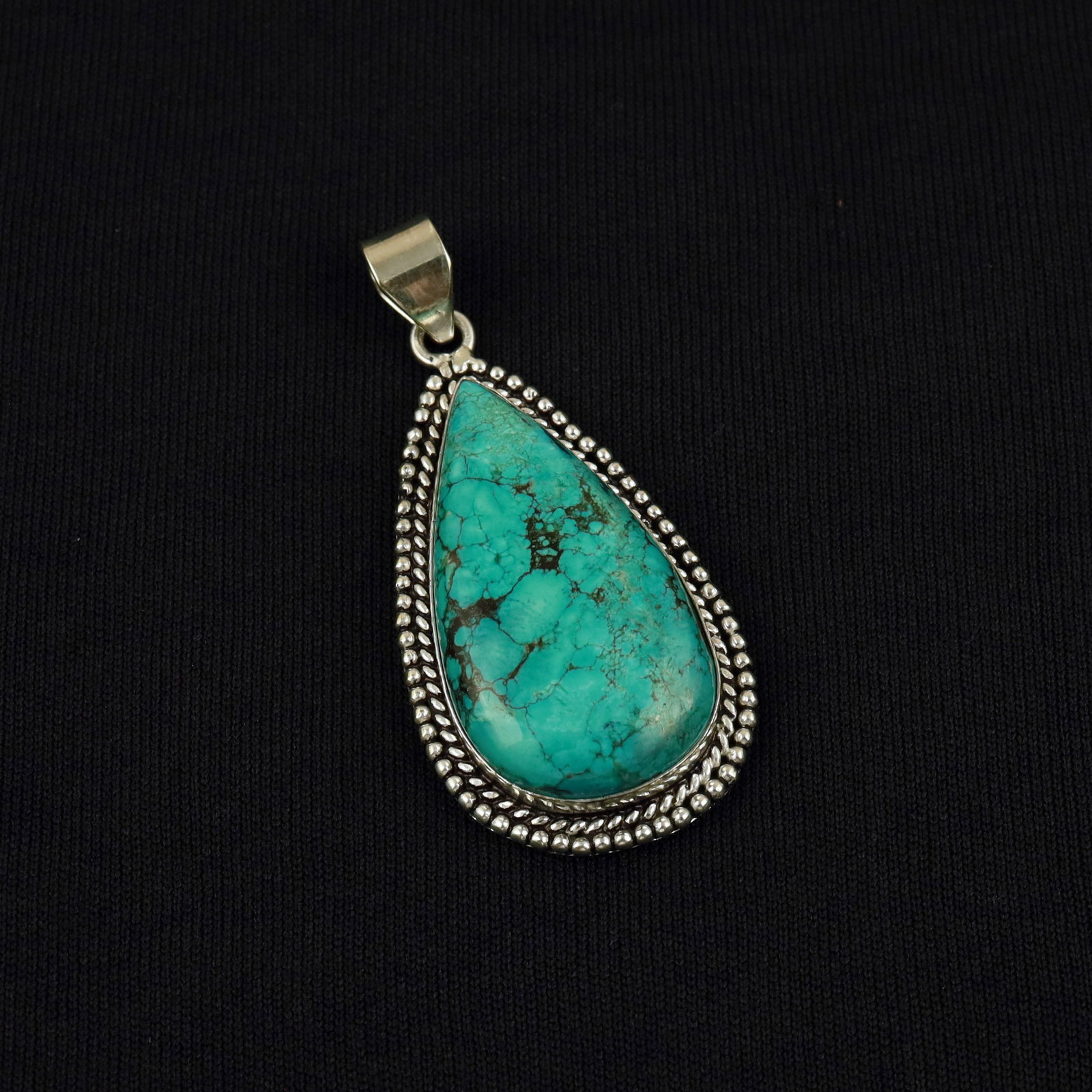 Natural Turquoise Sterling Silver Plated Handmade Pendant: Product ID: 260513103138 Product - Handmade Silver Plated Pendant Metal - 92.5 Sterling Silver Plated Pendant Size - 4.5x2.5 CM Gemstone - Turquoise Gemstone Origin - Tibet Gemstone Shape - Pear Penda