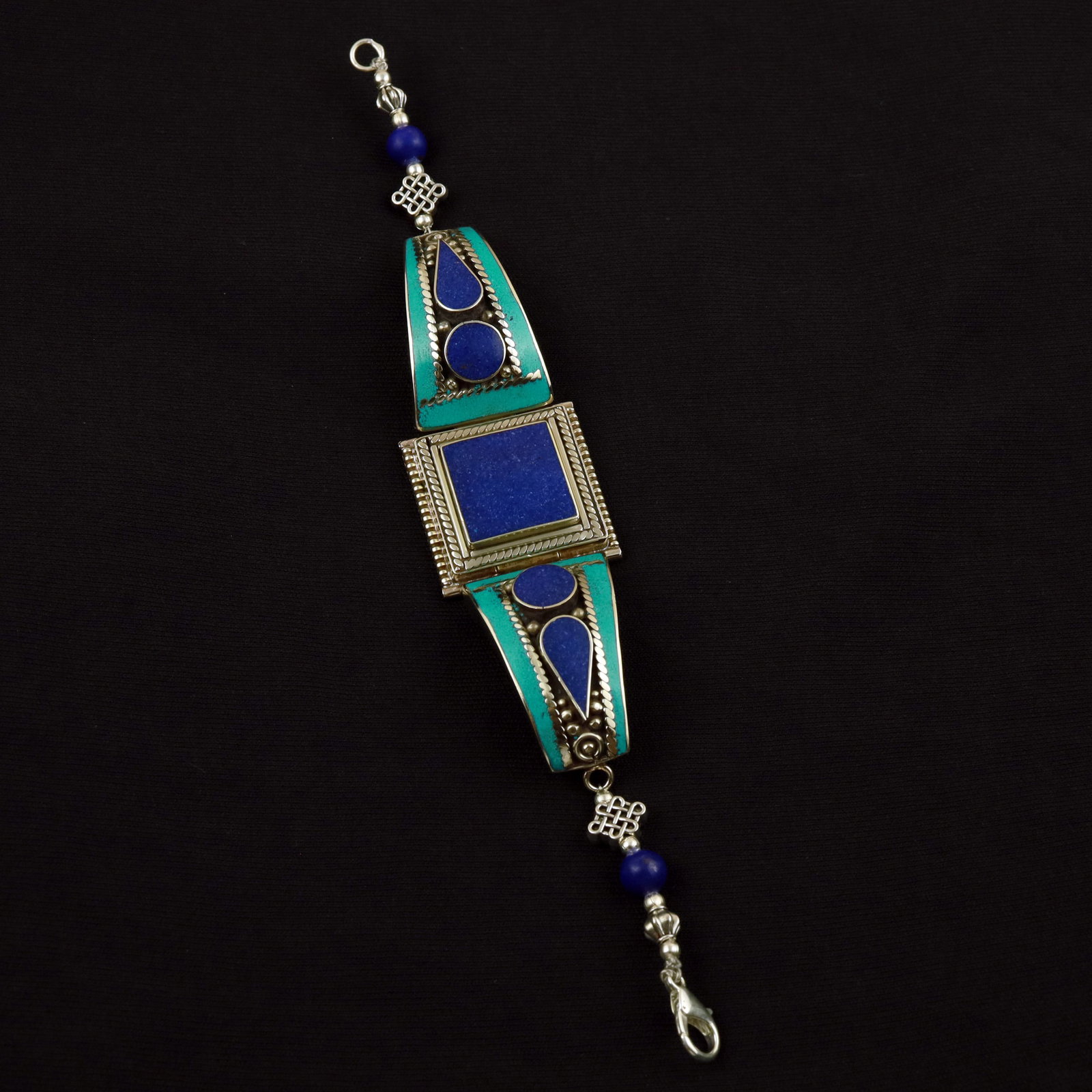Tibetan Turquoise & Afghani Lapis Lazuli Handmade Bracelet: Product ID: 260512185758 Product - Tibetan Handmade Ethnic Bracelet Gemstone - Natural Turquoise & Lapis Lazuli Size - 7 Inch Weight - 40 Gram Approx Metal - Brass & Copper mix Metal Origin - Nepal Co