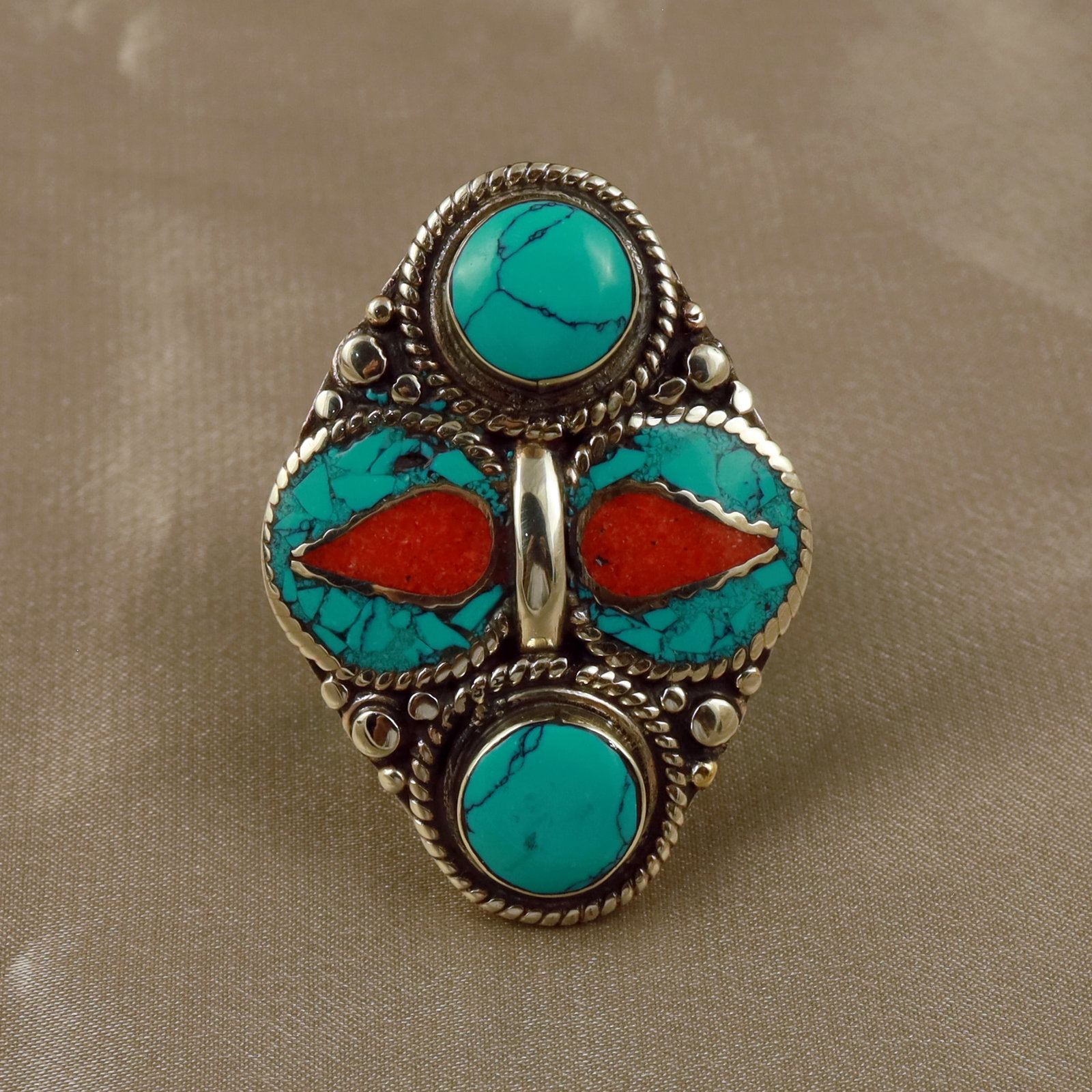 Tibetan Turquoise & Coral Handmade Boho Ring - Free Size: Product ID: 260512154056 Product - Tibetan Handmade Ethnic Ring Ring Size - Free Size Ring Weight - 21 Gram Gemstone - Natural Turquoise & Coral Metal - Brass & Copper mix Metal Origin - Nepal Country