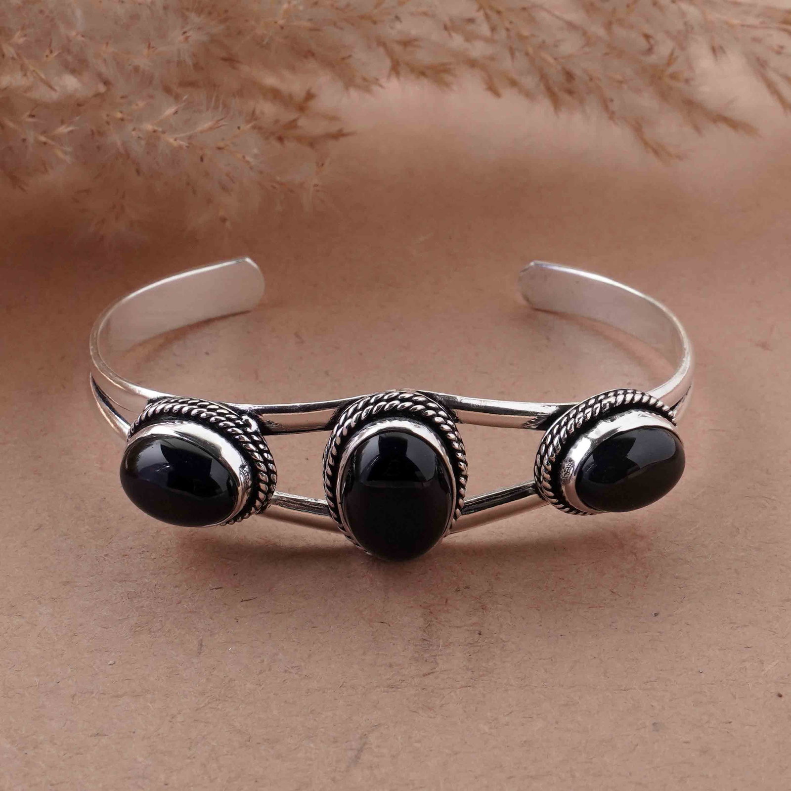Natural Black Onyx Sterling Silver Plated Handmade Cuff Bangle: Product ID: 260429153806 Product - Handmade Silver Plated Cuff Bangle Metal - 92.5 Sterling Silver Plated Bangle Size - 6.5x4.5 CM (Adjustable) Gemstone - Black Onyx Gemstone Origin - India Gemstone S