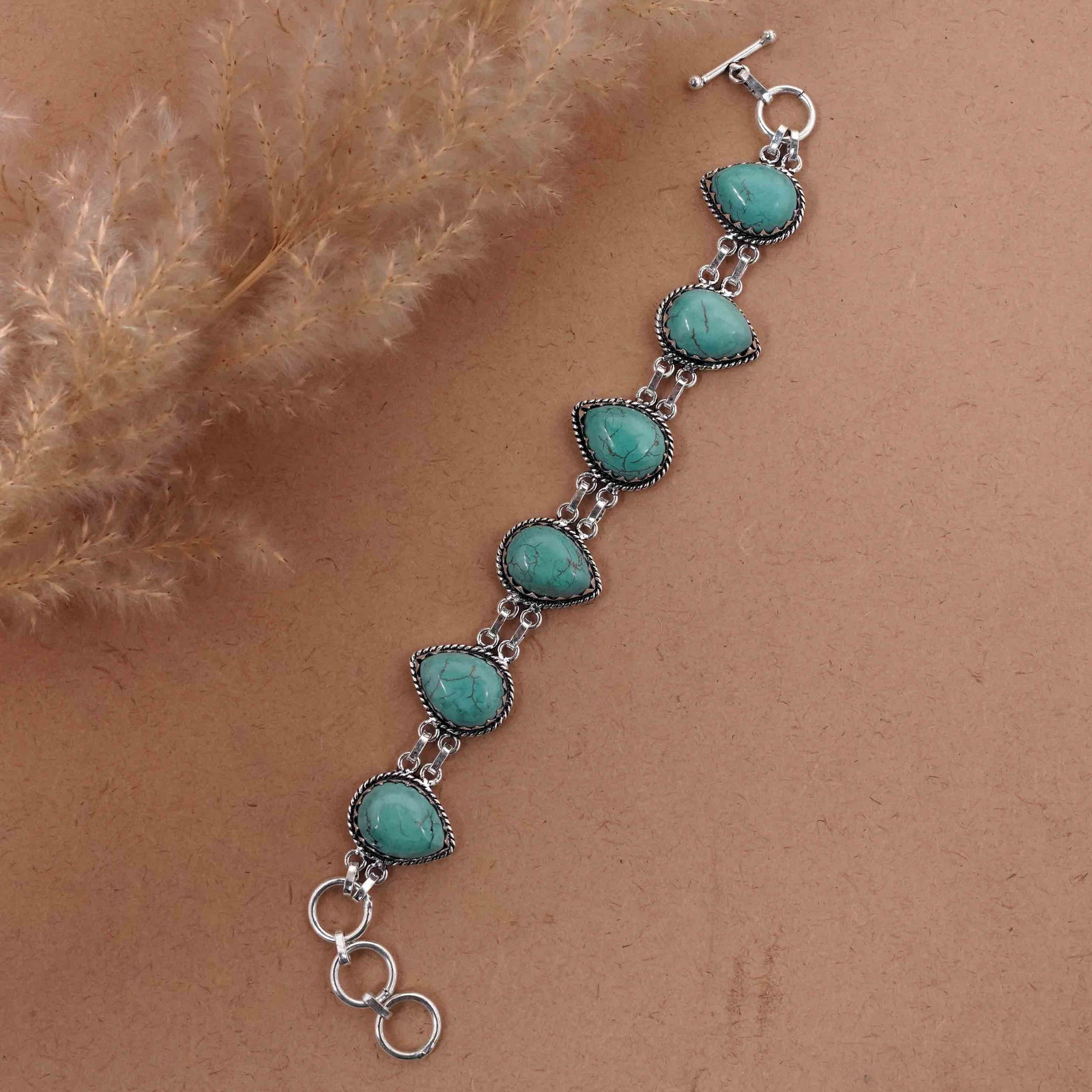 Natural Turquoise Sterling Silver Plated Handmade Bracelet: Product ID: 260416161056 Product - Handmade Silver Plated Bracelet Metal - 92.5 Sterling Silver Plated Bracelet Length - 6 Inch + 2 Inch Gemstone - Turquoise Gemstone Size -12X16 MM ( 6 Stone) Gemston