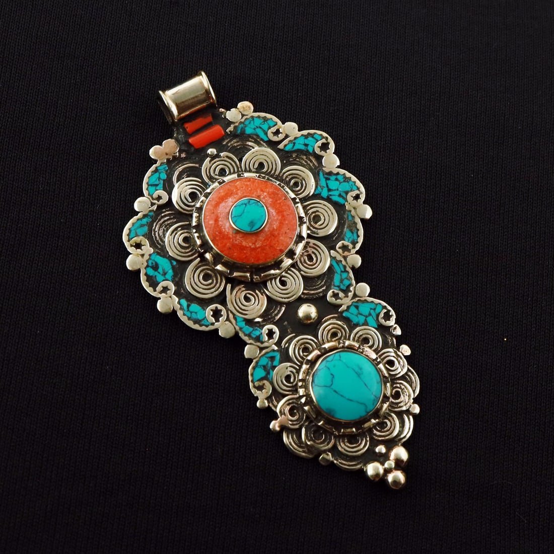 Tibetan Turquoise & Coral Handmade Ethnic Pendant: Product ID: 260721175705 Product - Tibetan Handmade Ethnic Pendant Pendant Size - 8X4 CM Pendant Weight - 26 Gram Gemstone - Turquoise & Coral Metal - Brass & Copper mix Metal Origin - Nepal Country/R