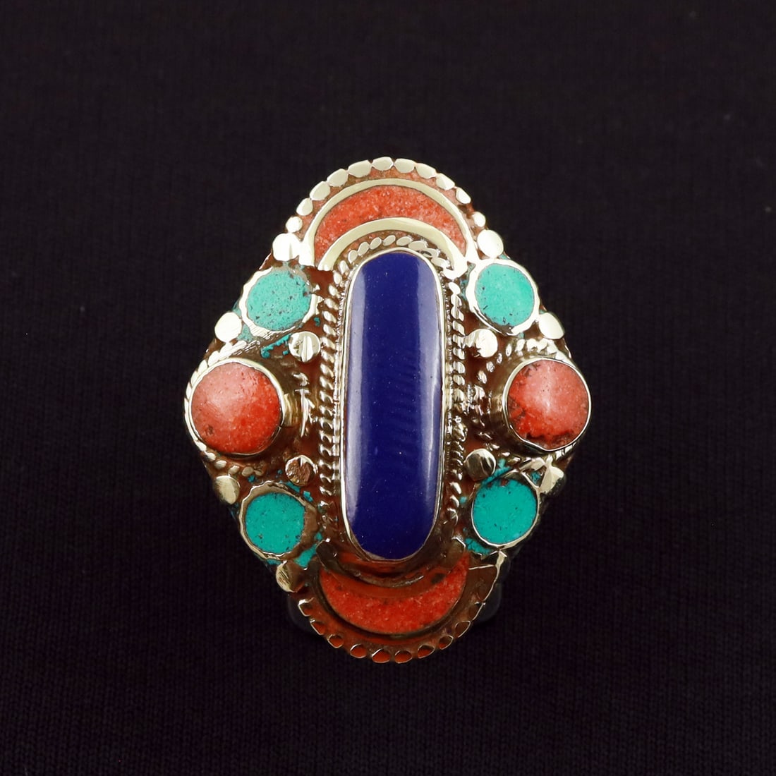 Tibetan Turquoise, Coral & Lapis Lazuli Handmade Ethnic Ring - Free Size: Product ID: 260721173349 Product - Tibetan Handmade Ethnic Ring Ring Size - Free Size Ring Weight - 21 Gram Gemstone - Turquoise & Coral & Lapis Lazuli Metal - Brass & Copper mix Metal Origin - Nepal 