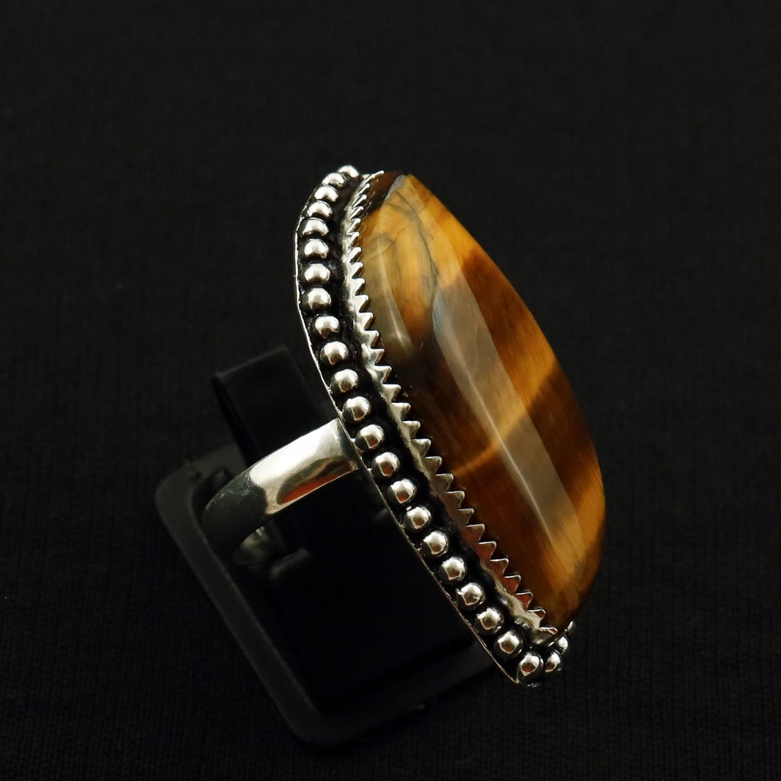 Natural Tiger Eye 2 Micron Sterling Silver Plated Handmade Ring - 9.5MM: Product ID: 260721153951 Product - Handmade Silver Plated Ring Metal - 92.5 2 Micron Sterling Silver Plated Ring Size - 9.5MM Gemstone - Tiger Eye Gemstone Origin - Africa Gemstone Size - 3.5X1.5 CM G
