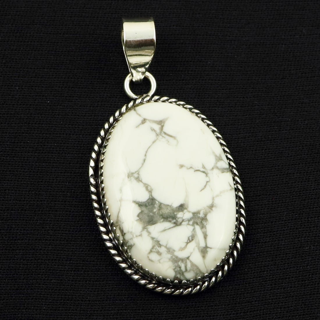 Natural Howlite Sterling Silver Plated Handmade Pendant: Product ID: 260714160315 Product - Handmade Silver Plated Pendant Metal - 92.5 Sterling Silver Plated Pendant Size - 3.5x2.5 CM Gemstone - Howlite Gemstone Origin - Canada Gemstone Shape - Oval Pendan