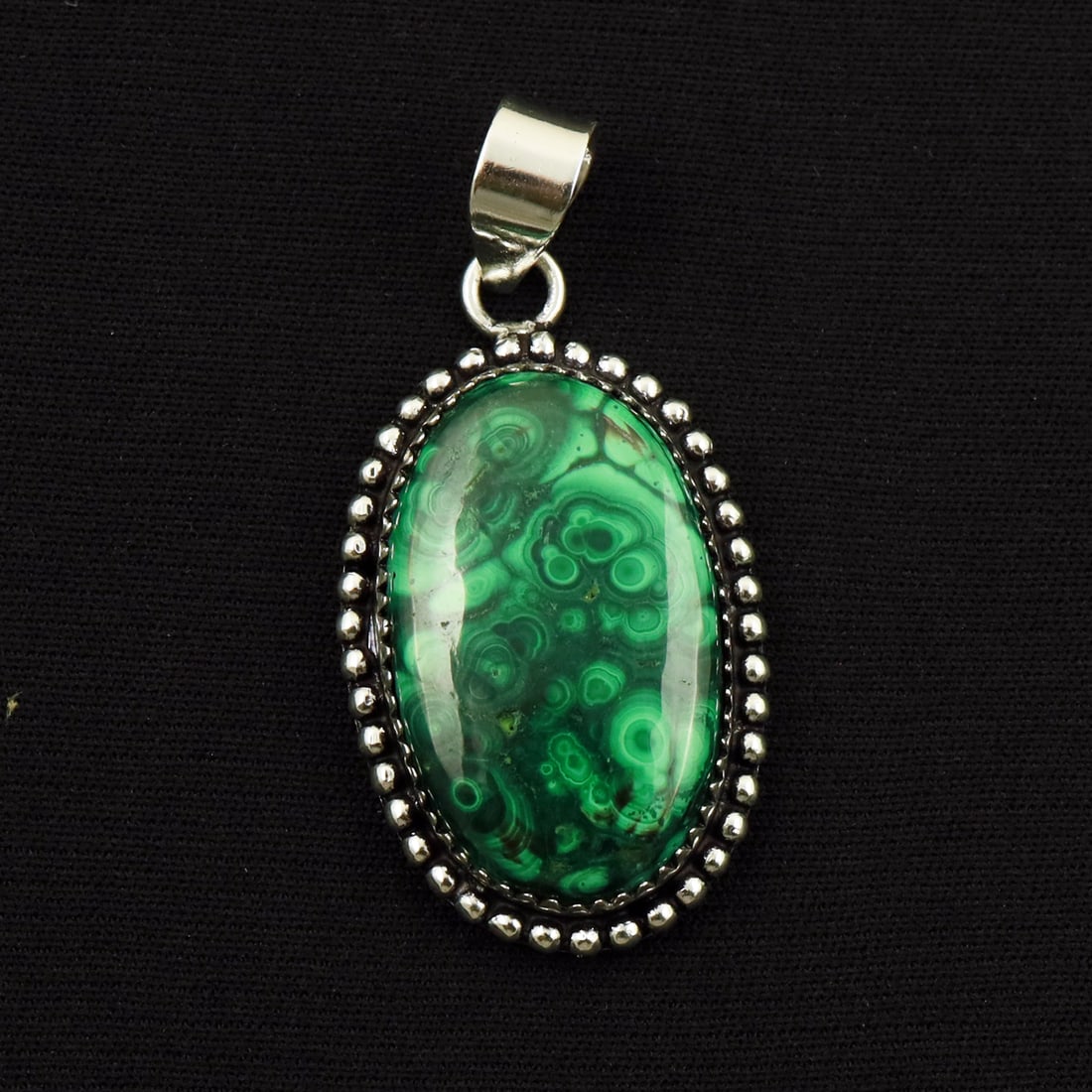 Natural Malachite Sterling Silver Plated Handmade Pendant: Product ID: 260714163448 Product - Handmade Silver Plated Pendant Metal - 92.5 Sterling Silver Plated Pendant Size - 3x2 CM Gemstone - Malachite Gemstone Origin - Democratic Republic of Congo Gemstone