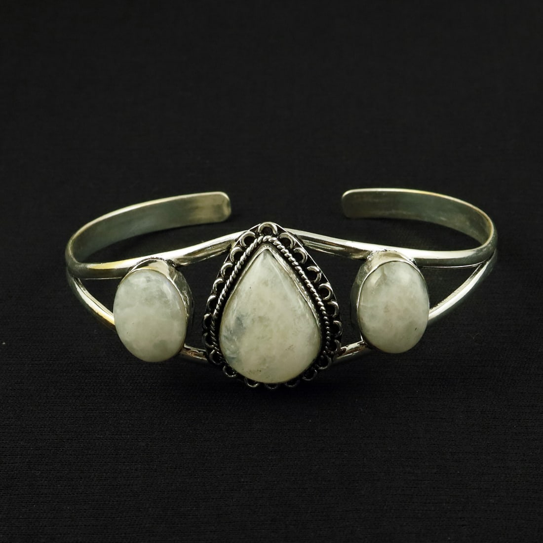 Natural Rainbow Moonstone Silver Plated Handmade Cuff Bangle: Product ID: 260524153948 Product - Handmade Silver Plated Cuff Bangle Metal - 92.5 Sterling Silver Plated Bangle Size - 7.5x5.5 CM (Adjustable) Gemstone - Rainbow Moonstone Gemstone Origin - India Gem