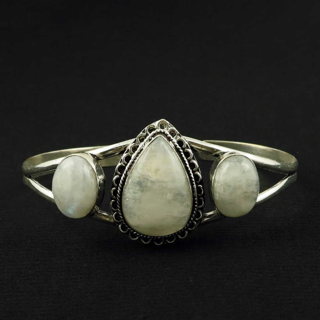 Natural Rainbow Moonstone Silver Plated Handmade Cuff Bangle: Product ID: 260524153337 Product - Handmade Silver Plated Cuff Bangle Metal - 92.5 Sterling Silver Plated Bangle Size - 7.5x5.5 CM (Adjustable) Gemstone - Rainbow Moonstone Gemstone Origin - India Gem