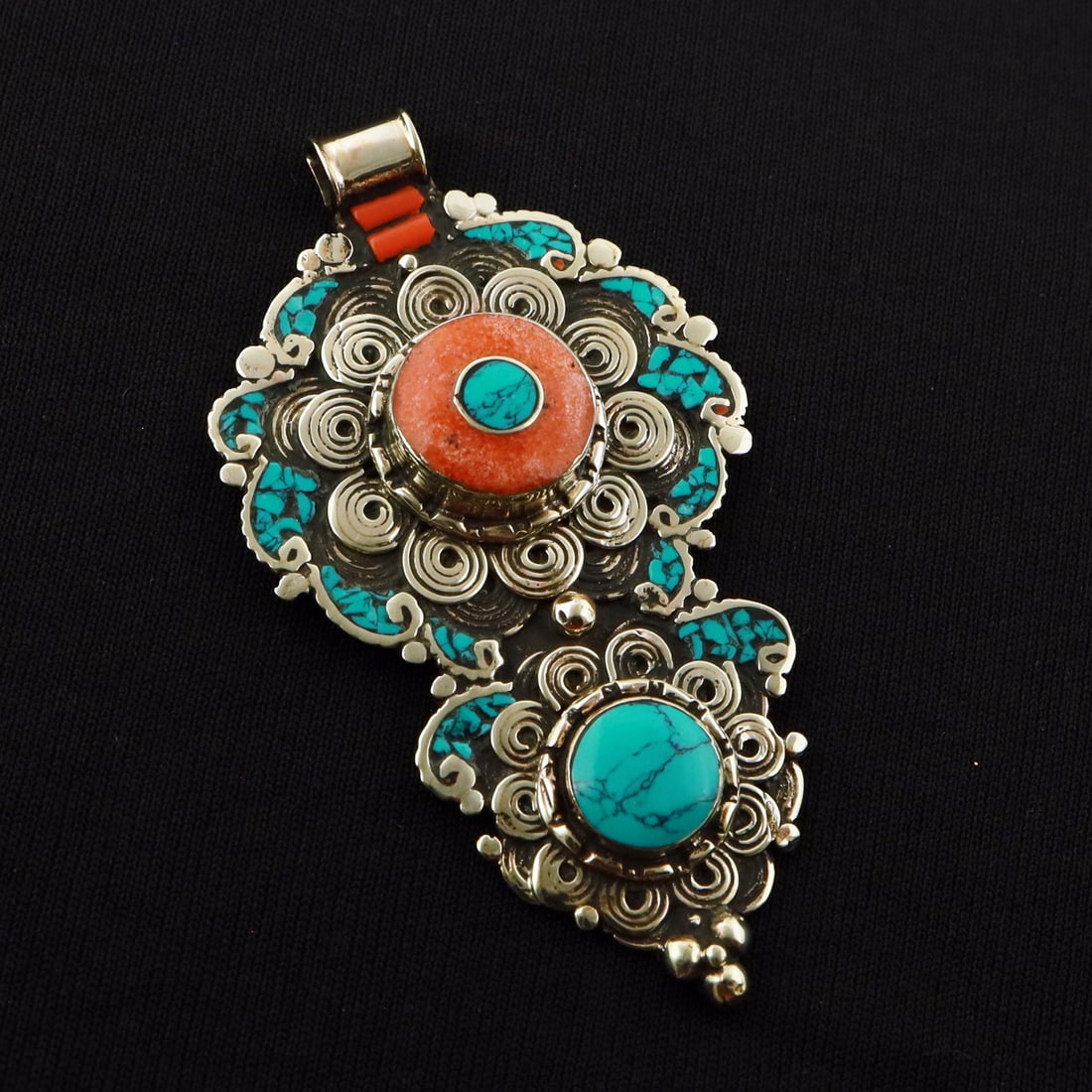Tibetan Turquoise & Coral Handmade Ethnic Boho Pendant: Product ID: 260721180234 Product - Tibetan Handmade Ethnic Pendant Pendant Size - 8X4 CM Pendant Weight - 26 Gram Gemstone - Turquoise & Coral Metal - Brass & Copper mix Metal Origin - Nepal Country/R
