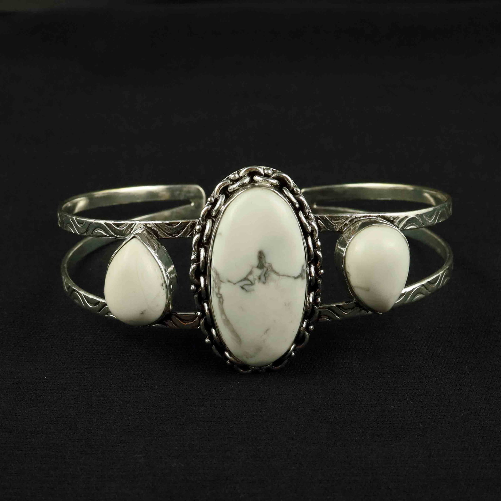 Natural Howlite Sterling Silver Plated Handmade Cuff Bangle: Product ID: 260522131933 Product - Handmade Silver Plated Cuff Bangle Metal - 92.5 Sterling Silver Plated Bangle Size - 7.5x5.5 CM (Adjustable) Gemstone - Howlite Gemstone Origin - Canada Gemstone Siz