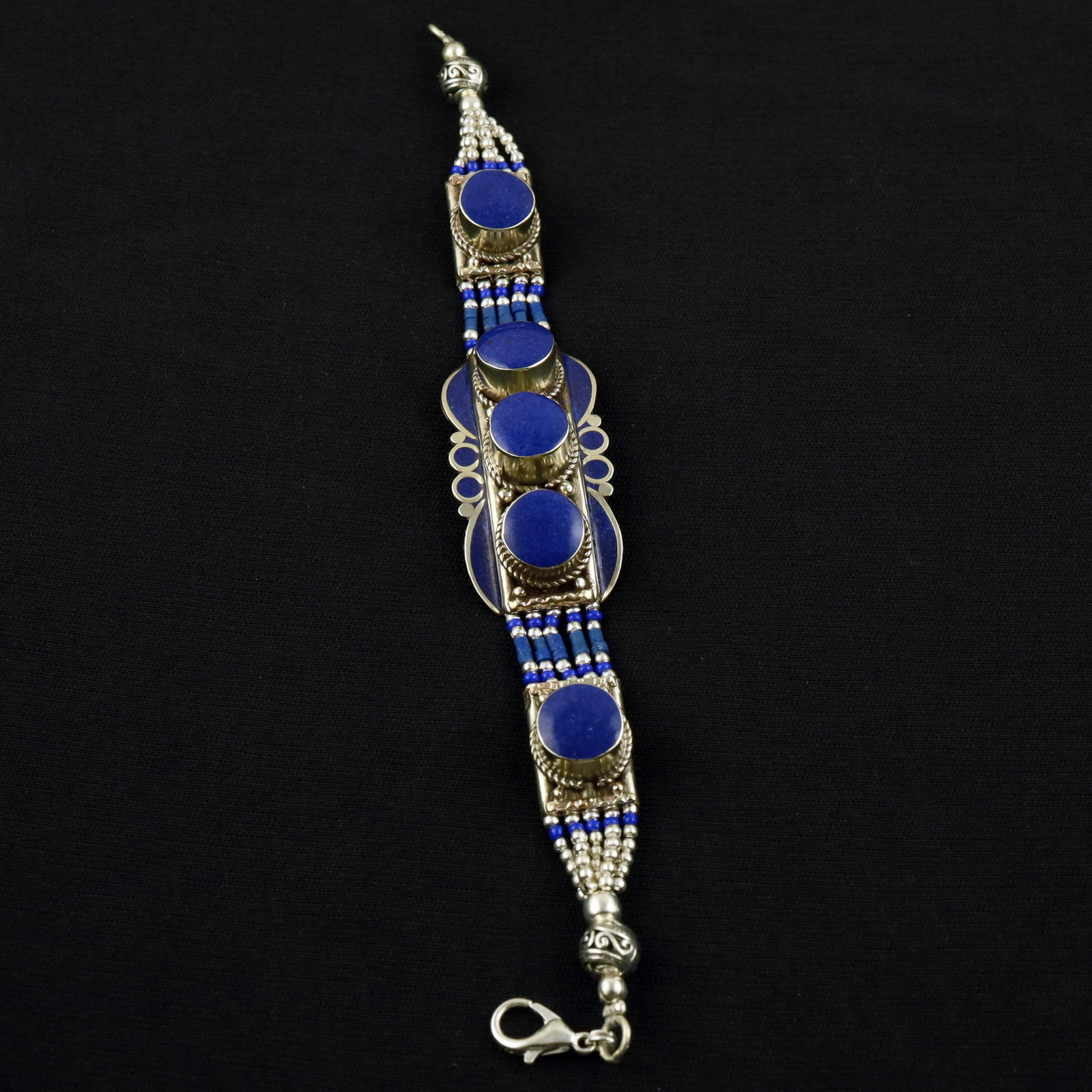 Afghani Natural Lapis Lazuli Handmade Ethnic Boho Bracelet: Product ID: 260520120338 Product - Tibetan Handmade Ethnic Bracelet Gemstone - Natural Lapis Lazuli Size - 7 Inch Weight - 50 Gram Approx Metal - Brass & Copper mix Metal Origin - Nepal Country/Region