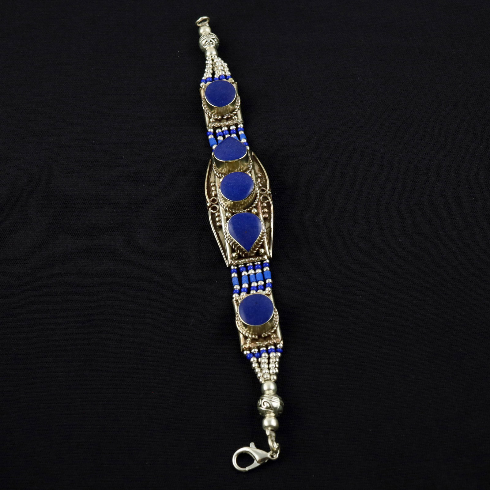 Afghani Natural Lapis Lazuli Handmade Boho Bracelet: Product ID: 260520120418 Product - Tibetan Handmade Ethnic Bracelet Gemstone - Natural Lapis Lazuli Size - 7 Inch Weight - 50 Gram Approx Metal - Brass & Copper mix Metal Origin - Nepal Country/Region