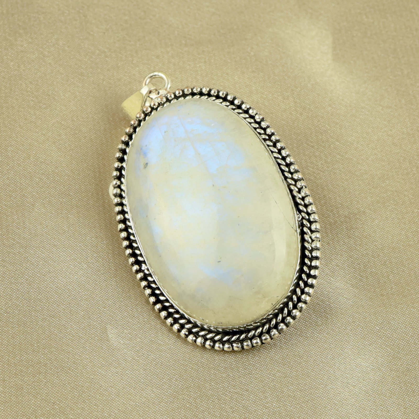 Natural Rainbow Moonstone Sterling Silver Plated Handmade Pendant: Product ID: 260518124912 Product - Handmade Silver Plated Pendant Metal - 92.5 Sterling Silver Plated Pendant Size - 5x3.5CM Gemstone - Rainbow Moonstone Gemstone Origin - India Gemstone Shape - Oval 