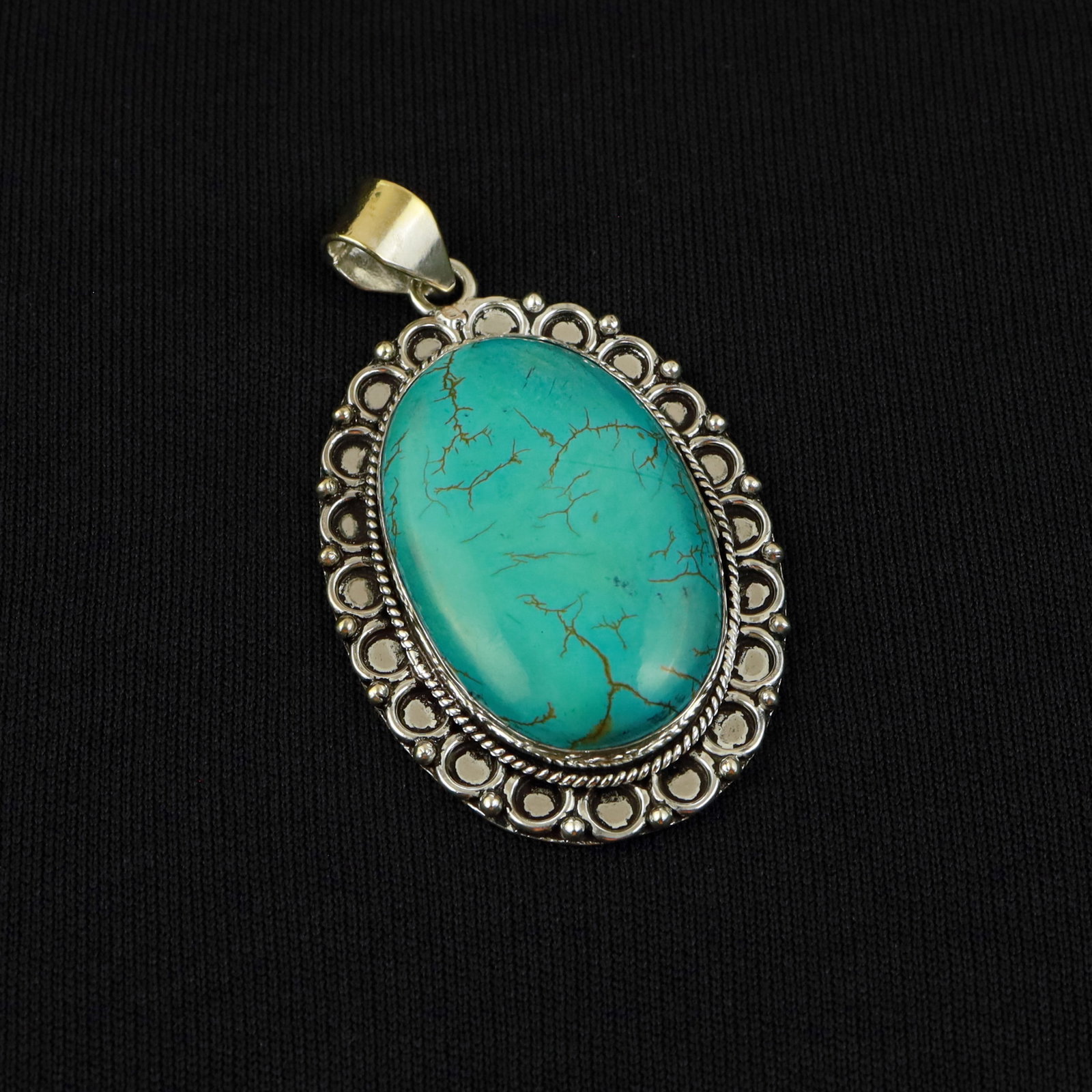 Natural Turquoise Sterling Silver Plated Handmade Pendant: Product ID: 260517183459 Product - Handmade Silver Plated Pendant Metal - 92.5 Sterling Silver Plated Pendant Size - 4.5x3.5 CM Gemstone - Turquoise Gemstone Origin - Tibet Gemstone Shape - Oval Penda