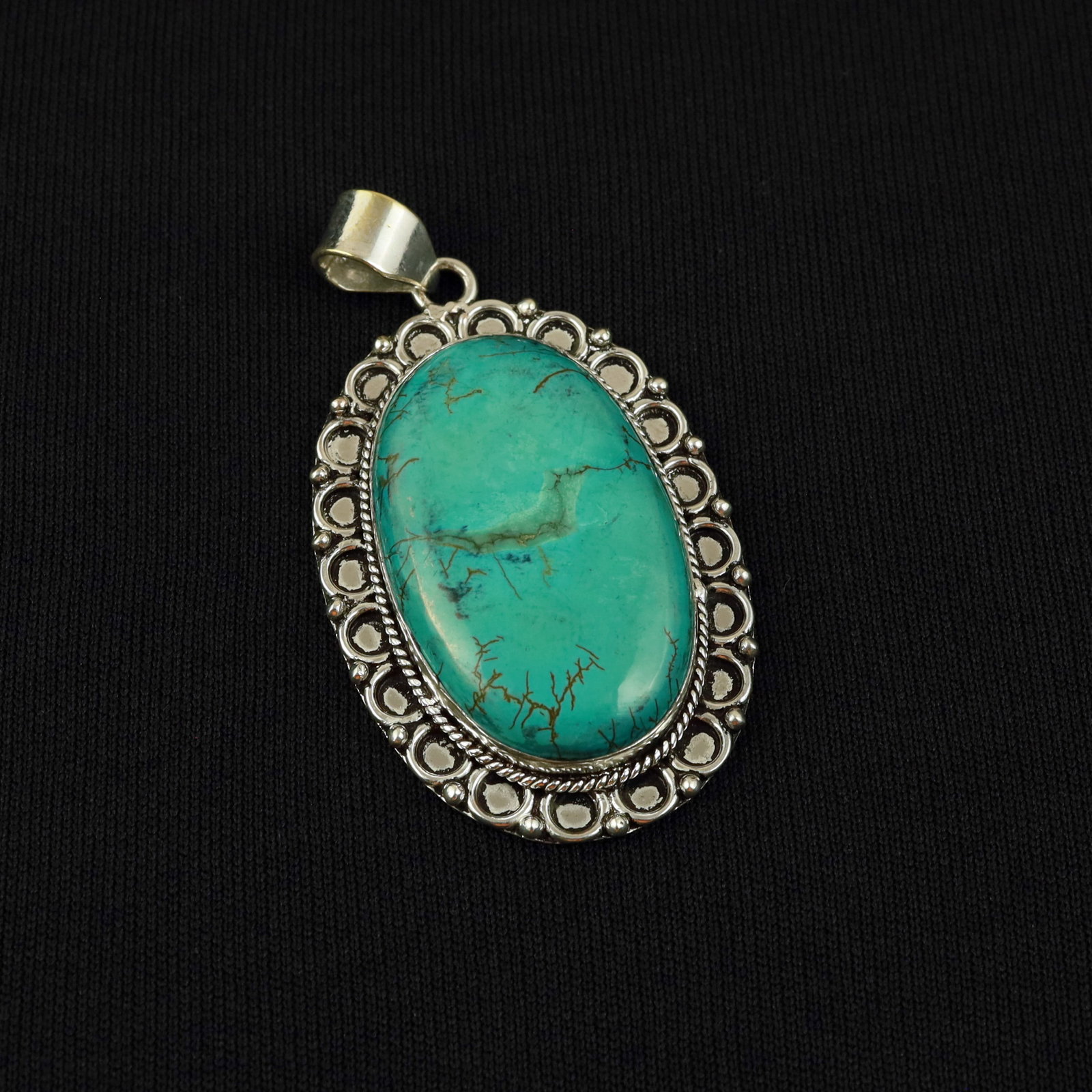 Natural Turquoise Sterling Silver Plated Handmade Pendant: Product ID: 260517183618 Product - Handmade Silver Plated Pendant Metal - 92.5 Sterling Silver Plated Pendant Size - 4.5x3 CM Gemstone - Turquoise Gemstone Origin - Tibet Gemstone Shape - Oval Pendant