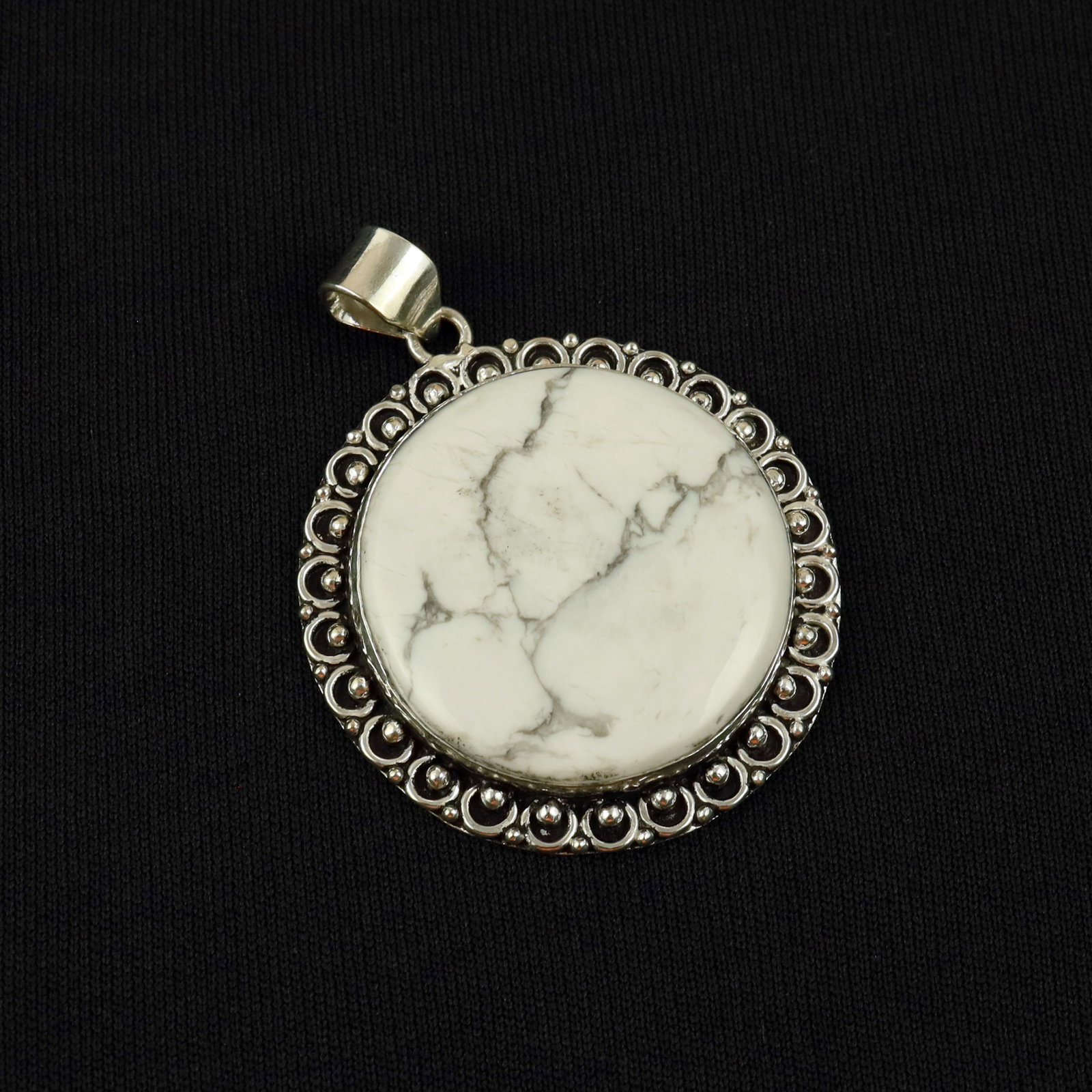 Natural Howlite Sterling Silver Plated Handmade Pendant: Product ID: 260517184540 Product - Handmade Silver Plated Pendant Metal - 92.5 Sterling Silver Plated Pendant Size - 4.5 CM Gemstone - Howlite Gemstone Origin - Canada Gemstone Shape - Round Pendant W