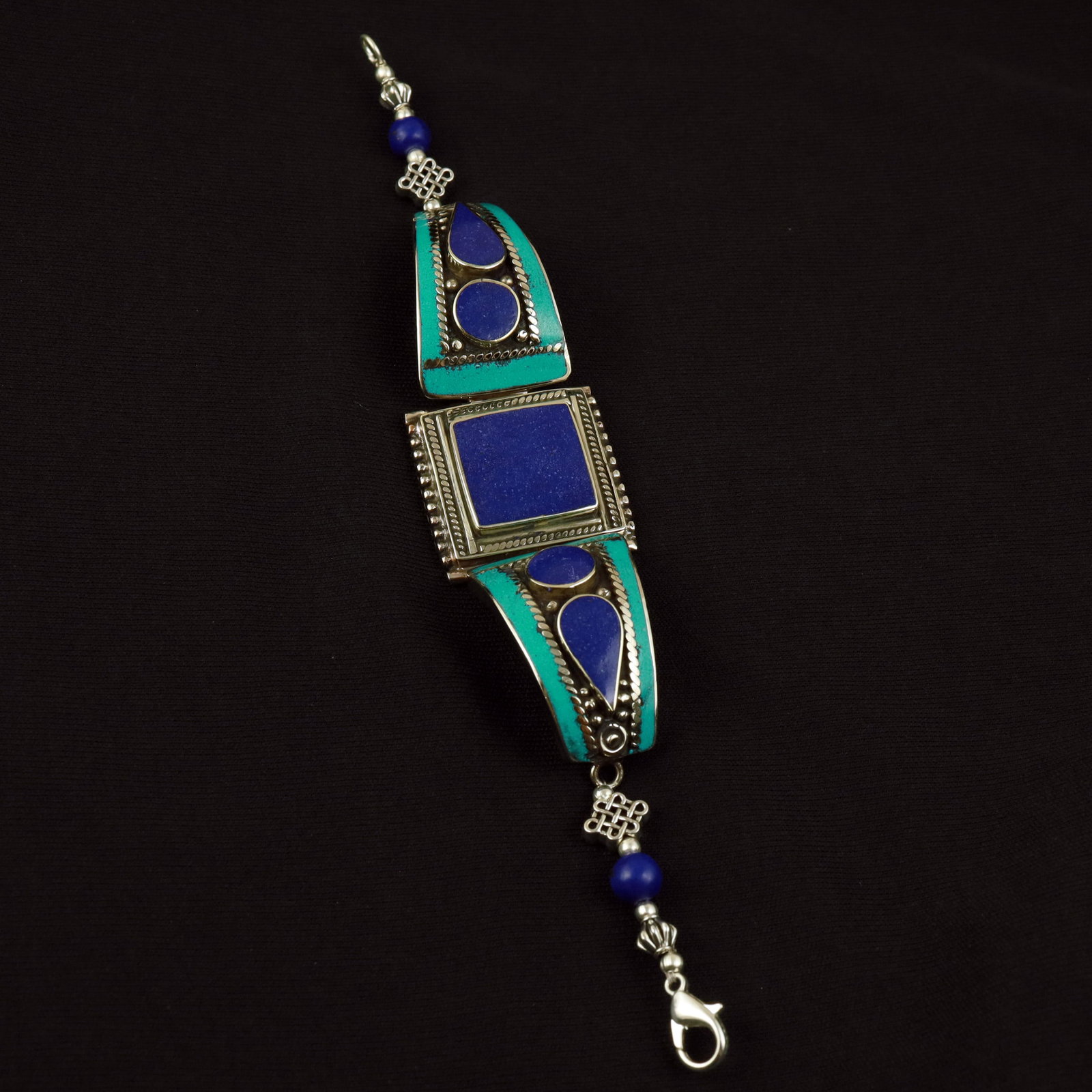 Tibetan Natural Turquoise & Lapis Lazuli Handmade Bold Bracelet: Product ID: 260517173929 Product - Tibetan Handmade Ethnic Bracelet Gemstone - Natural Turquoise & Lapis Lazuli Size - 7 Inch Weight - 45 Gram Approx Metal - Brass & Copper mix Metal Origin - Nepal Co