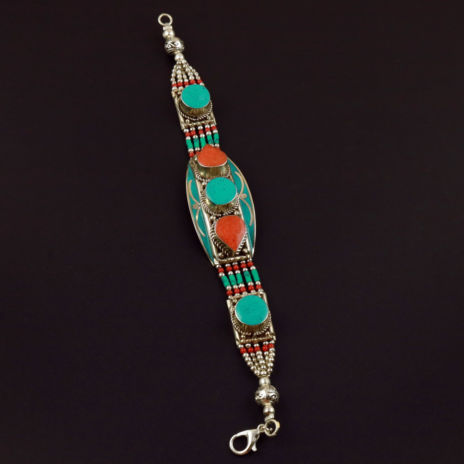 Tibetan Natural Turquoise & Coral Handmade Choker Bracelet: Product ID: 260513131509 Product - Tibetan Handmade Ethnic Bracelet Gemstone - Natural Turquoise & Coral Size - 7 Inch Weight - 50 Gram Approx Metal - Brass & Copper mix Metal Origin - Nepal Country/R