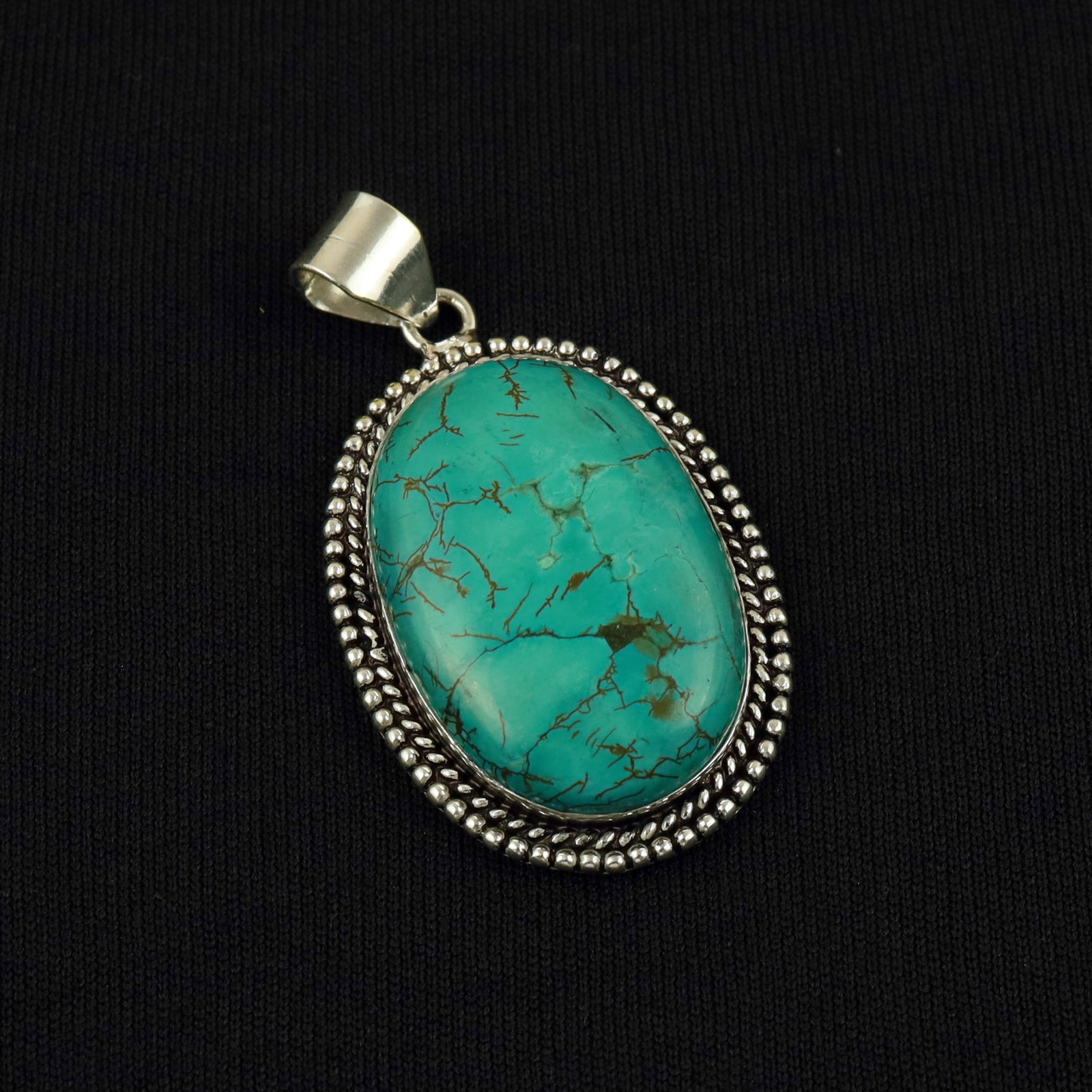 Natural Turquoise Sterling Silver Plated Handmade Beautiful Pendant: Product ID: 260513103523 Product - Handmade Silver Plated Pendant Metal - 92.5 Sterling Silver Plated Pendant Size - 4x3 CM Gemstone - Turquoise Gemstone Origin - Tibet Gemstone Shape - Oval Pendant W