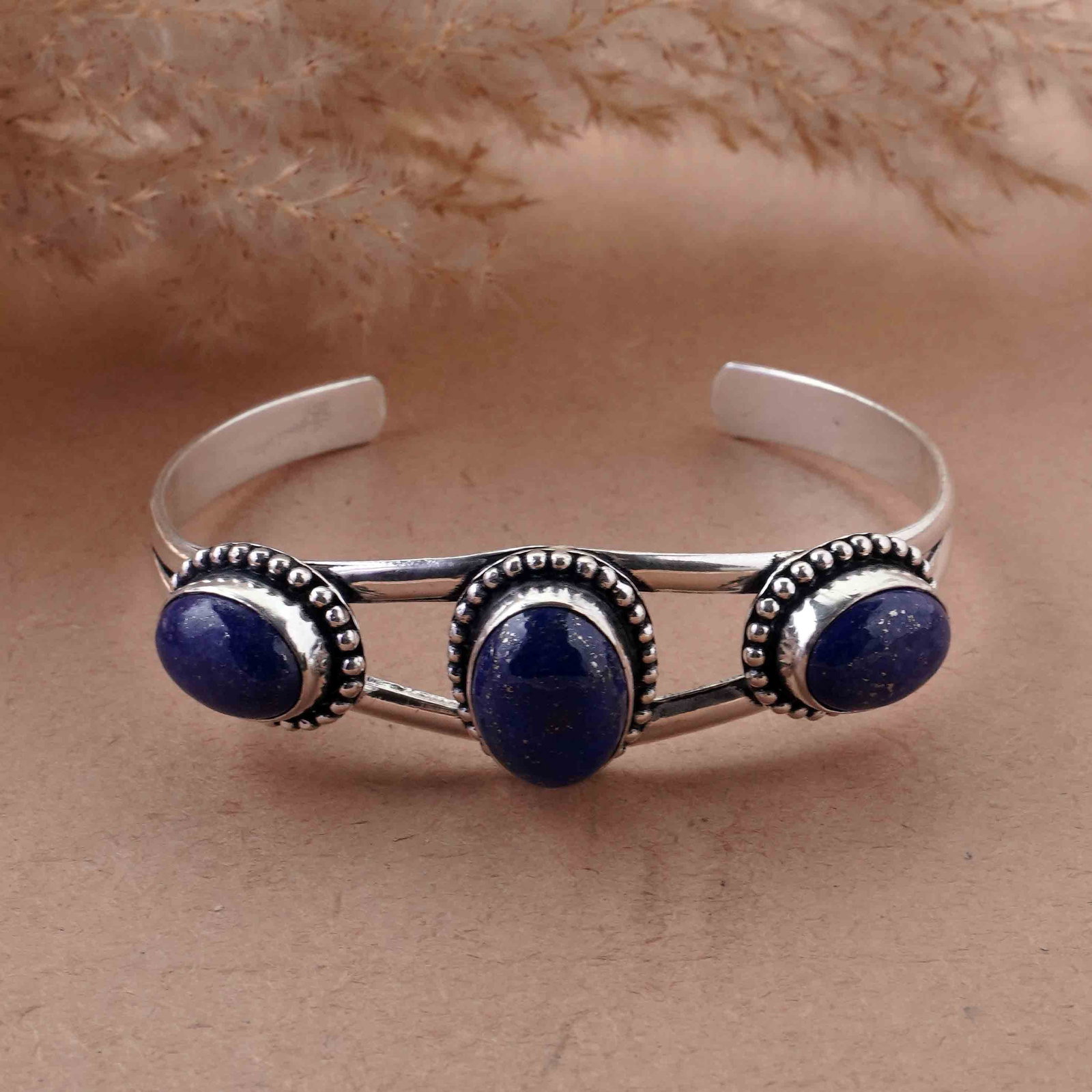 Natural Lapis Lazuli Sterling Silver Plated Handmade Cuff Bangle: Product ID: 260429153239 Product - Handmade Silver Plated Cuff Bangle Metal - 92.5 Sterling Silver Plated Bangle Size - 6.5x4.5 CM (Adjustable) Gemstone - Lapis Lazuli Gemstone Origin - Afghanistan Ge